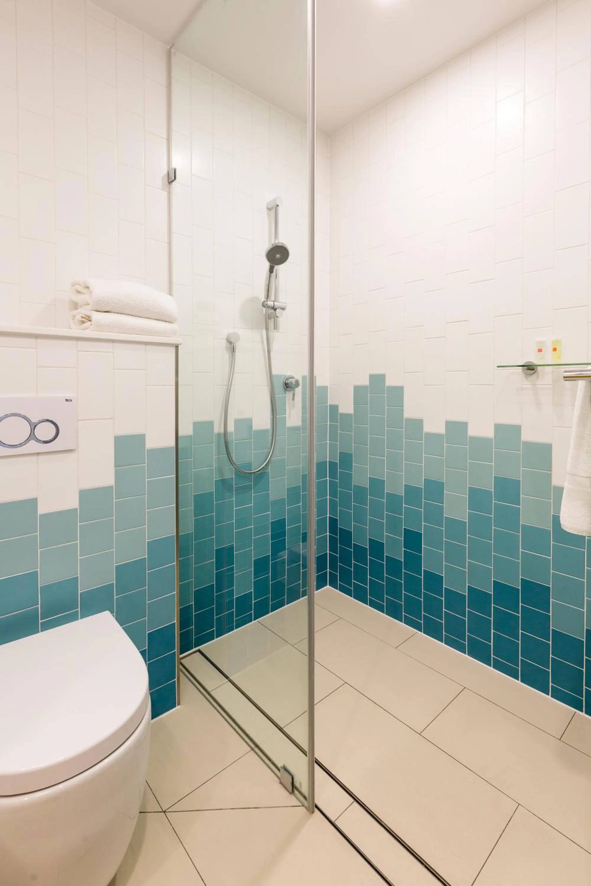 Bathroom in ibis Styles East Perth