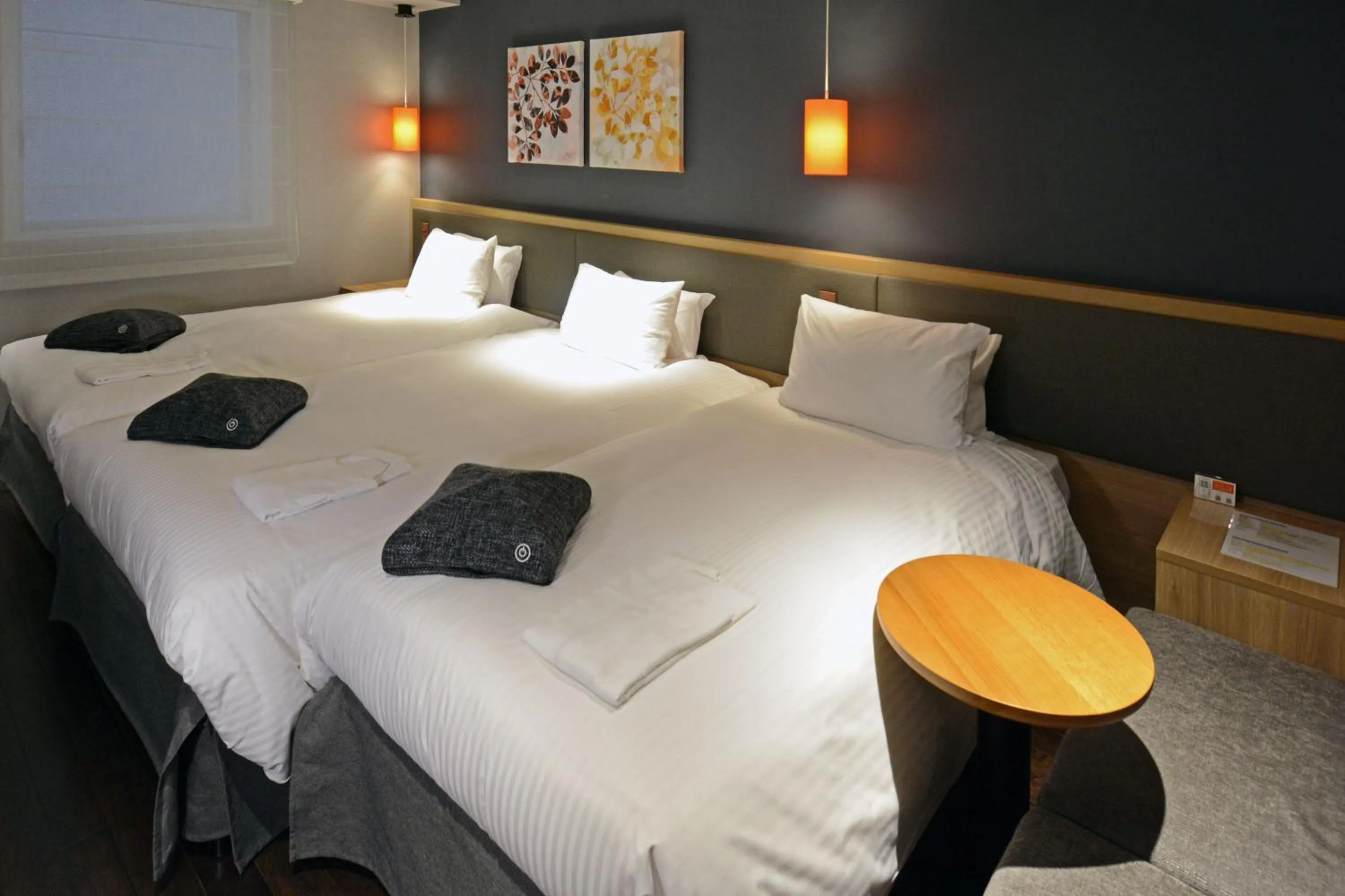 Bed in Hotel Forza Osaka Kitahama