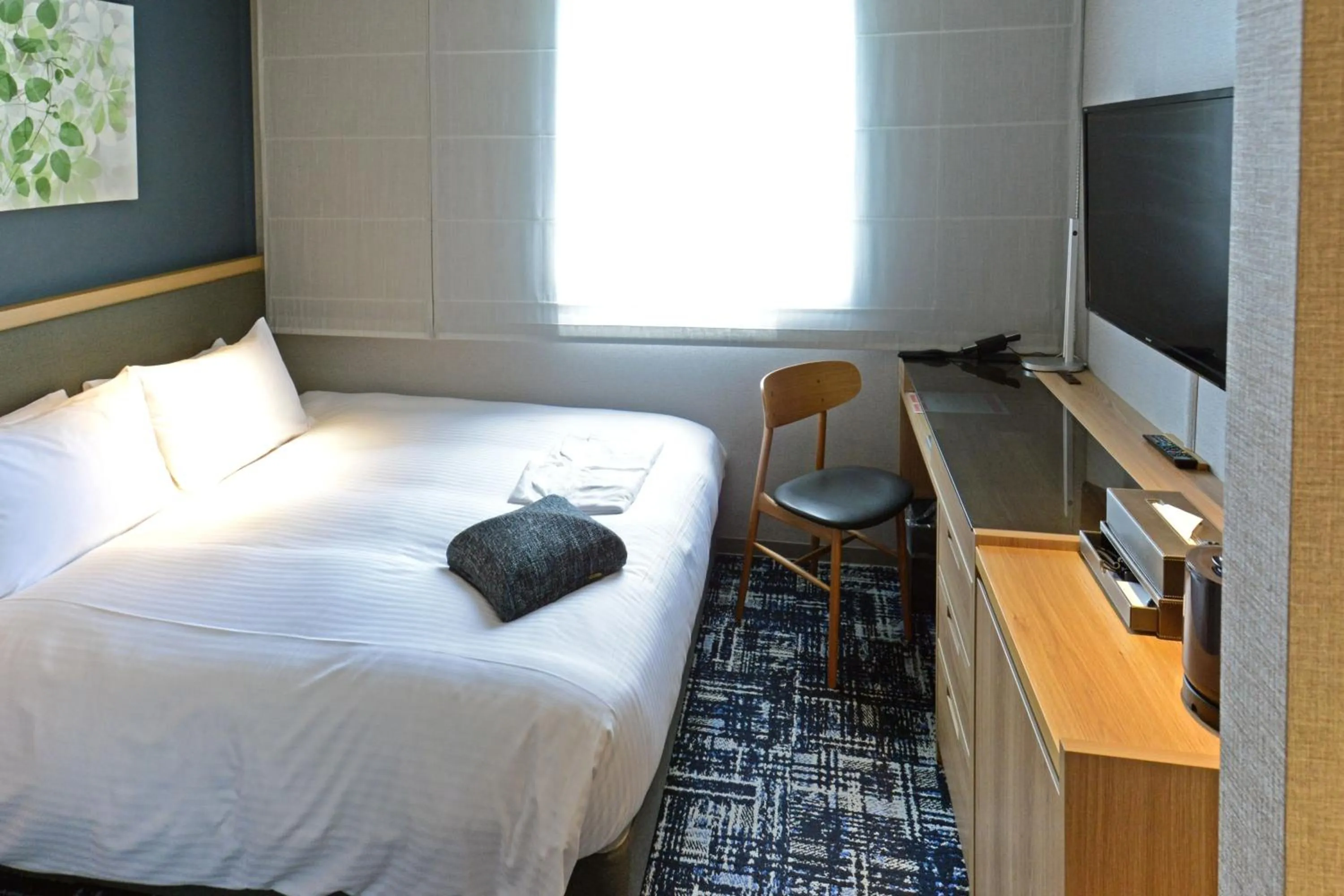 Bed in Hotel Forza Osaka Kitahama