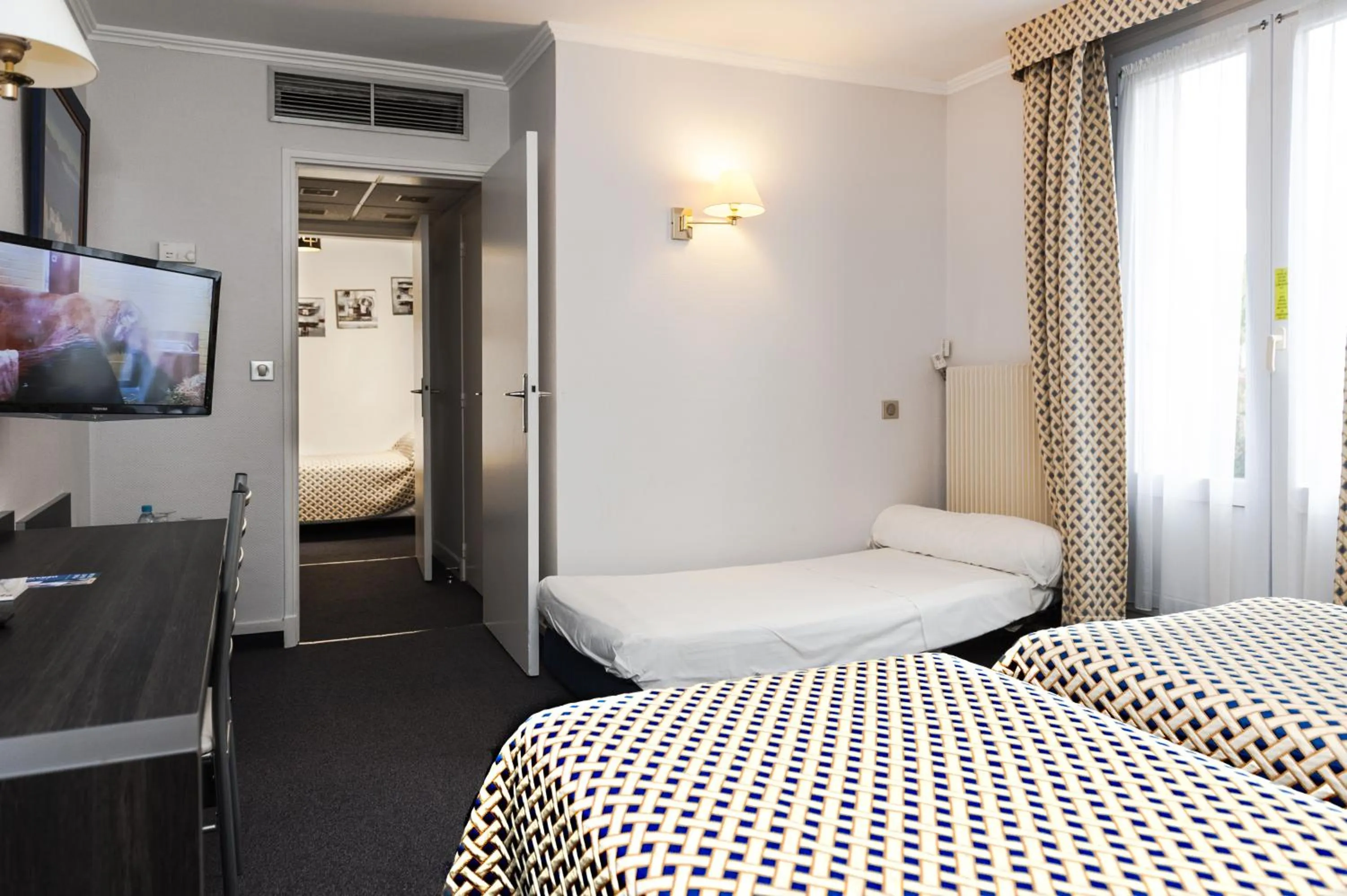 Photo of the whole room in Brit Hotel Cahors - Le France