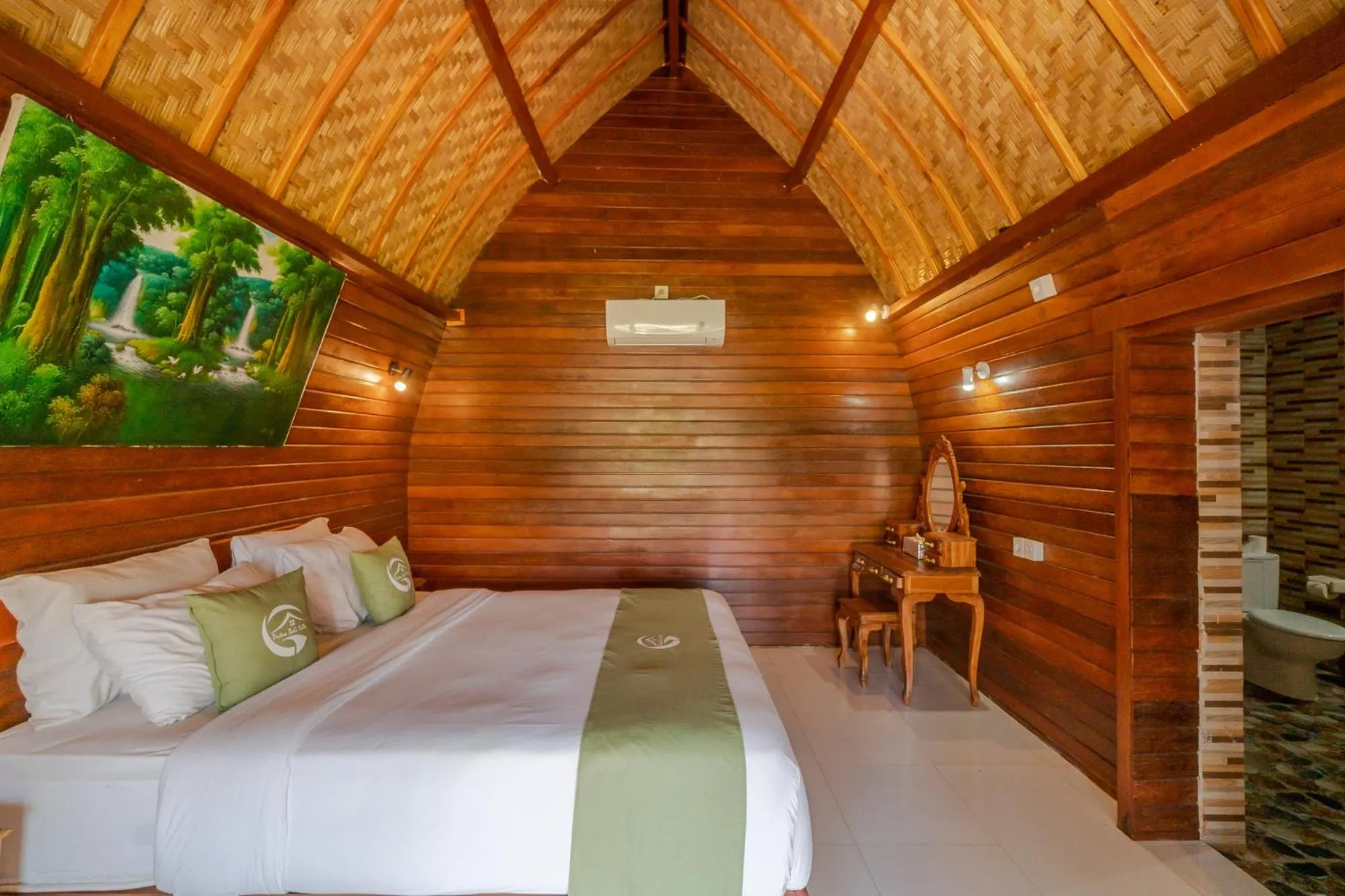 Bed in Putra Bali Villa by Bukit Vista