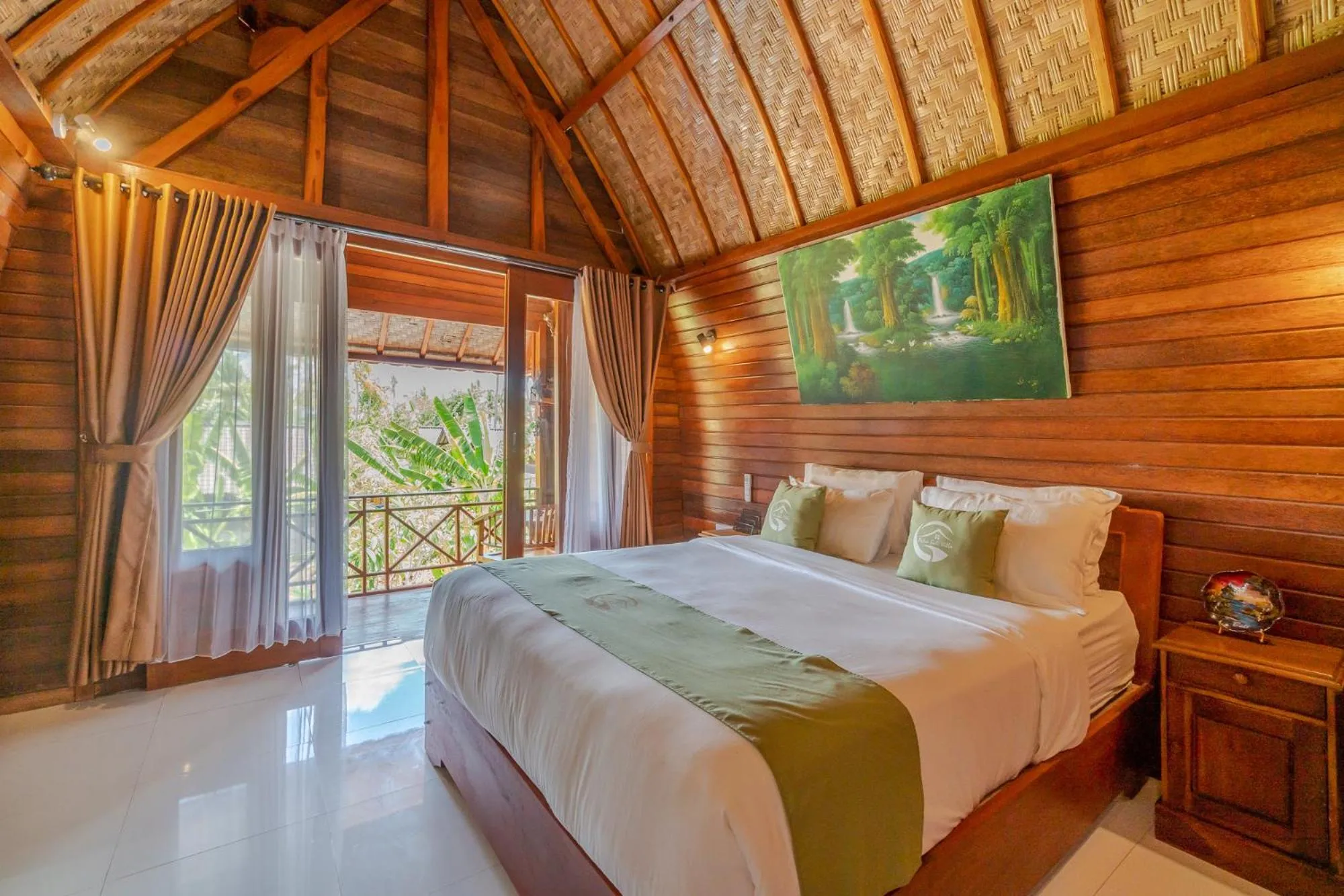 Bed in Putra Bali Villa by Bukit Vista