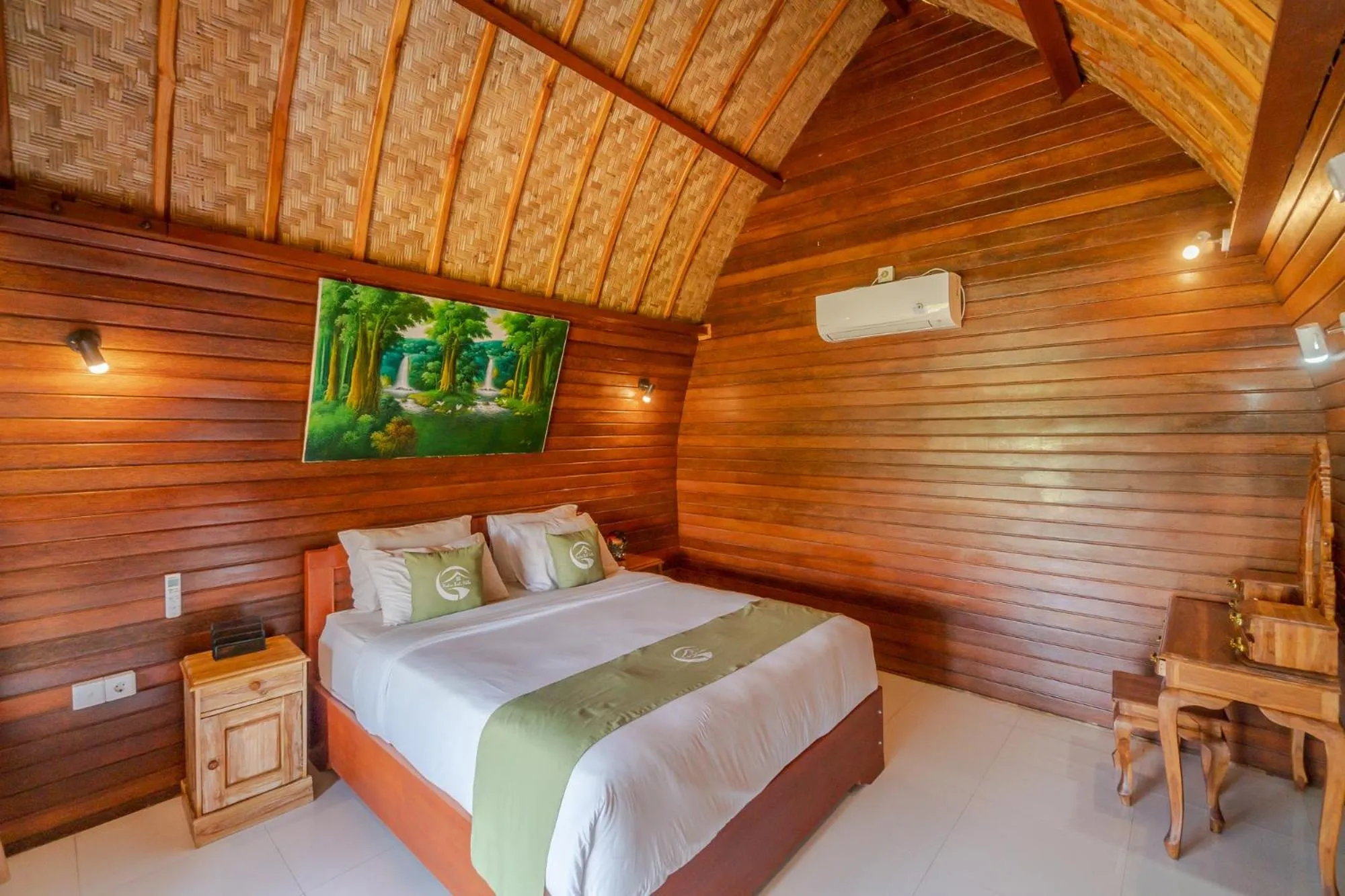 Bed in Putra Bali Villa by Bukit Vista