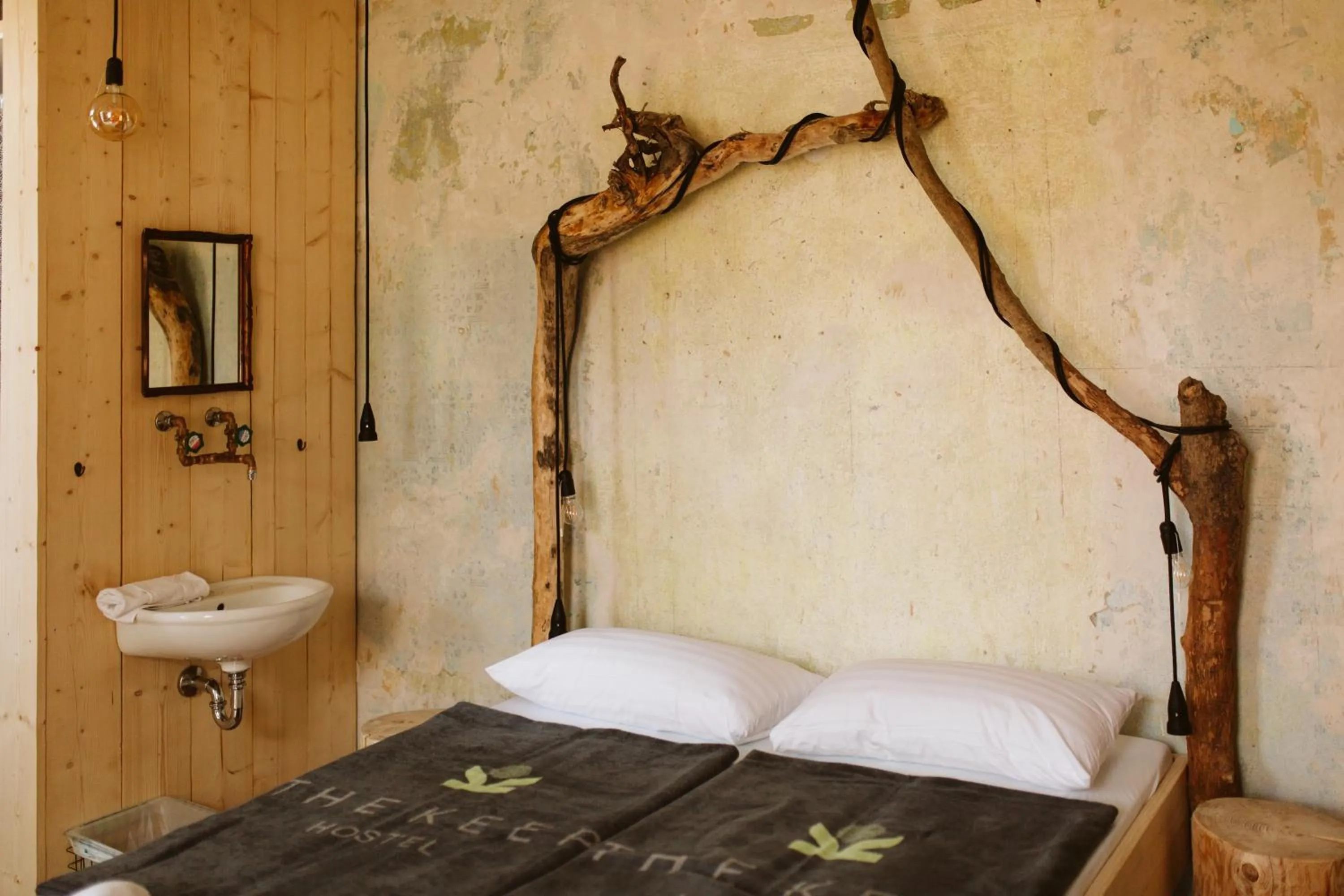 Bed in The Keep Eco Rooms