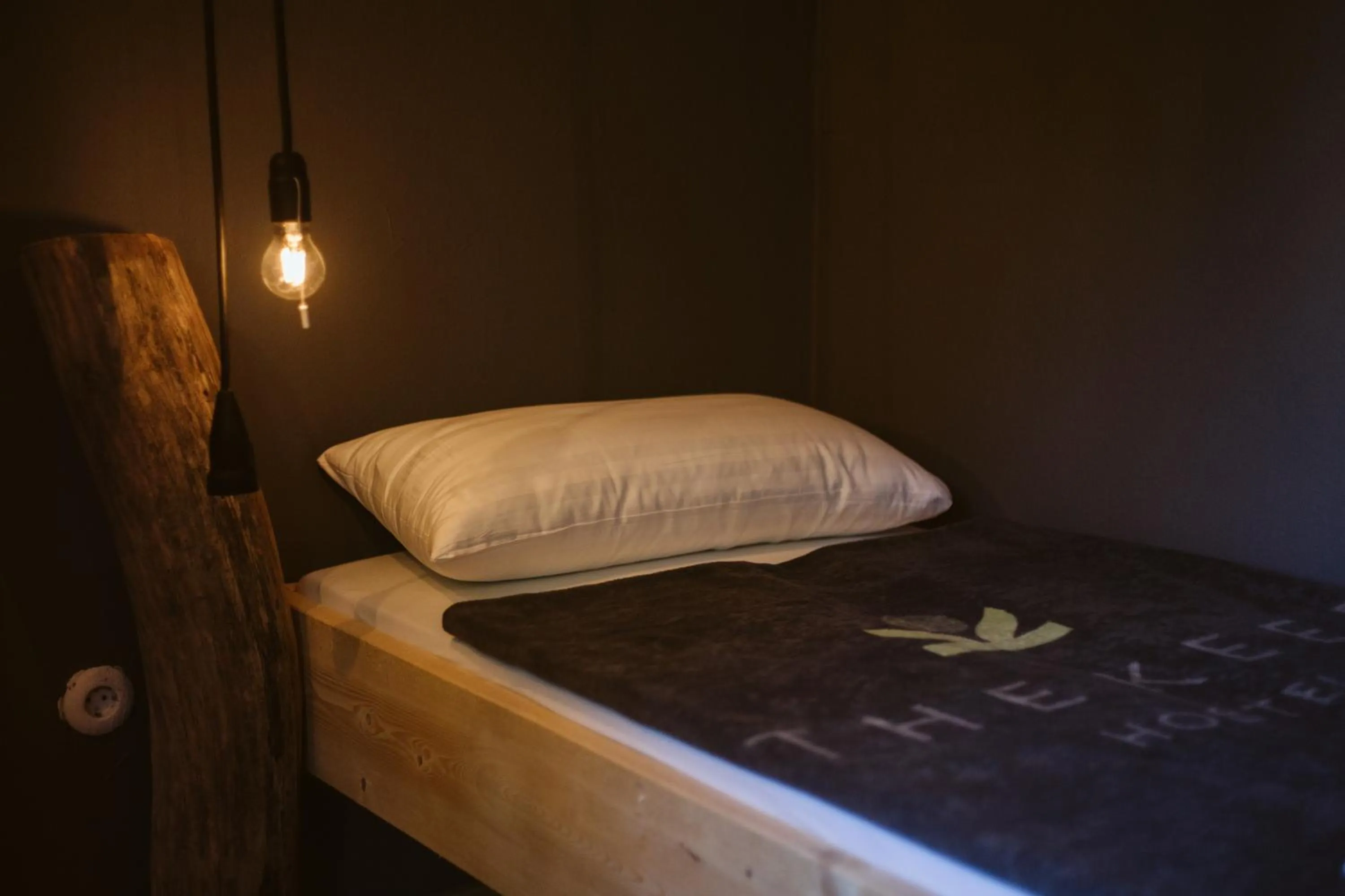 Bed in The Keep Eco Rooms