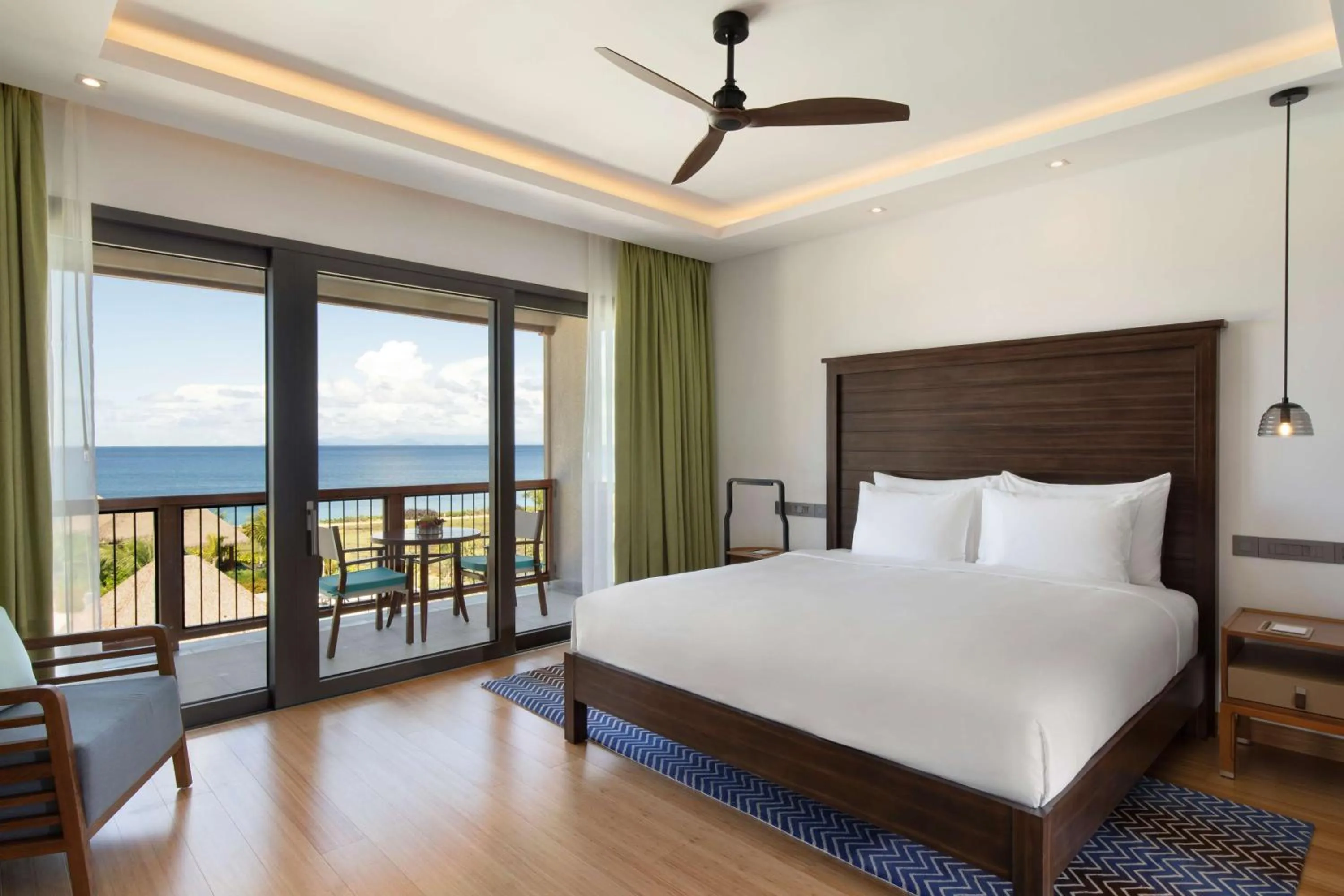 Photo of the whole room, Bed in InterContinental Dominica Cabrits Resort & Spa by IHG