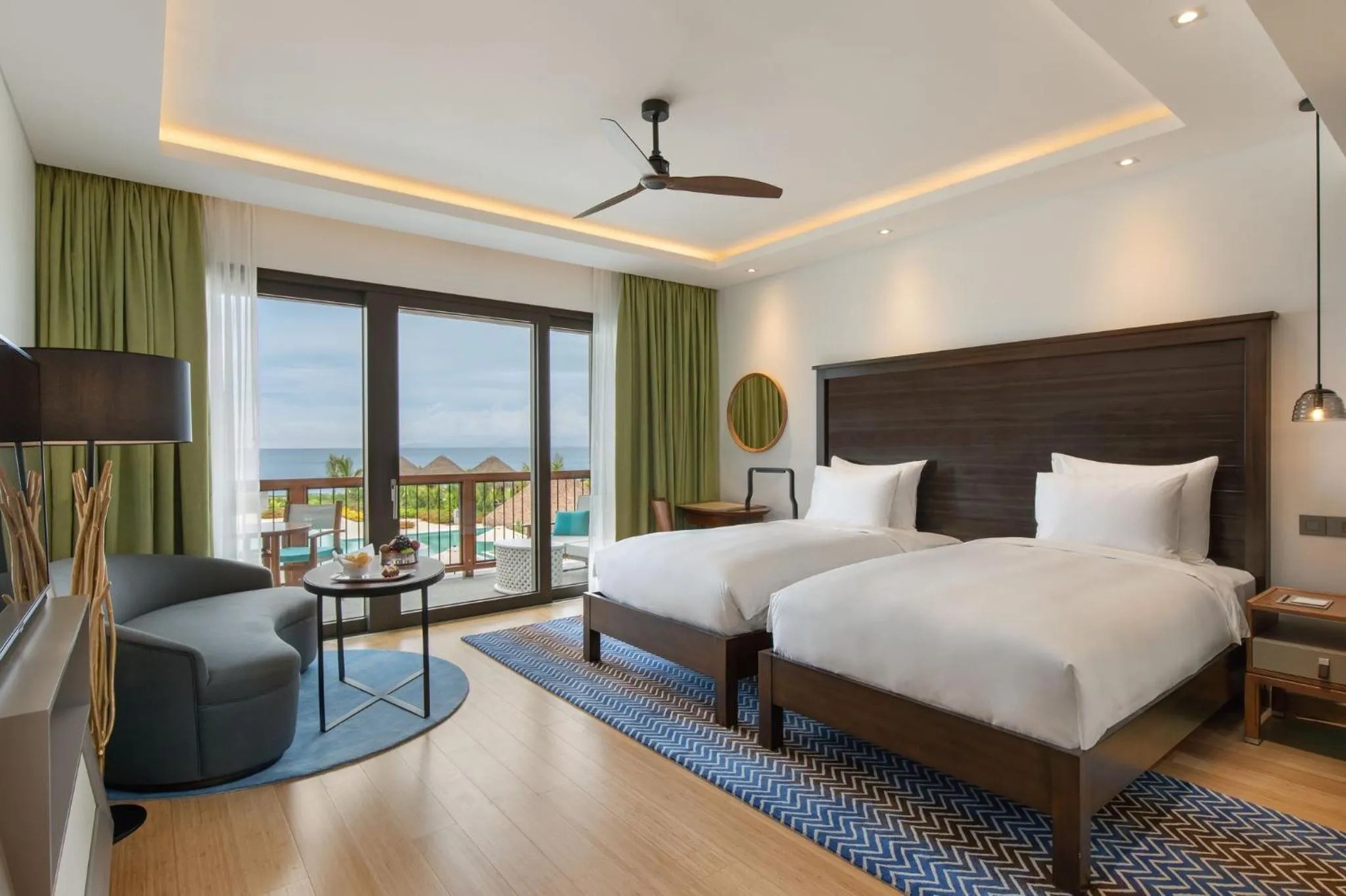 Photo of the whole room, Bed in InterContinental Dominica Cabrits Resort & Spa by IHG