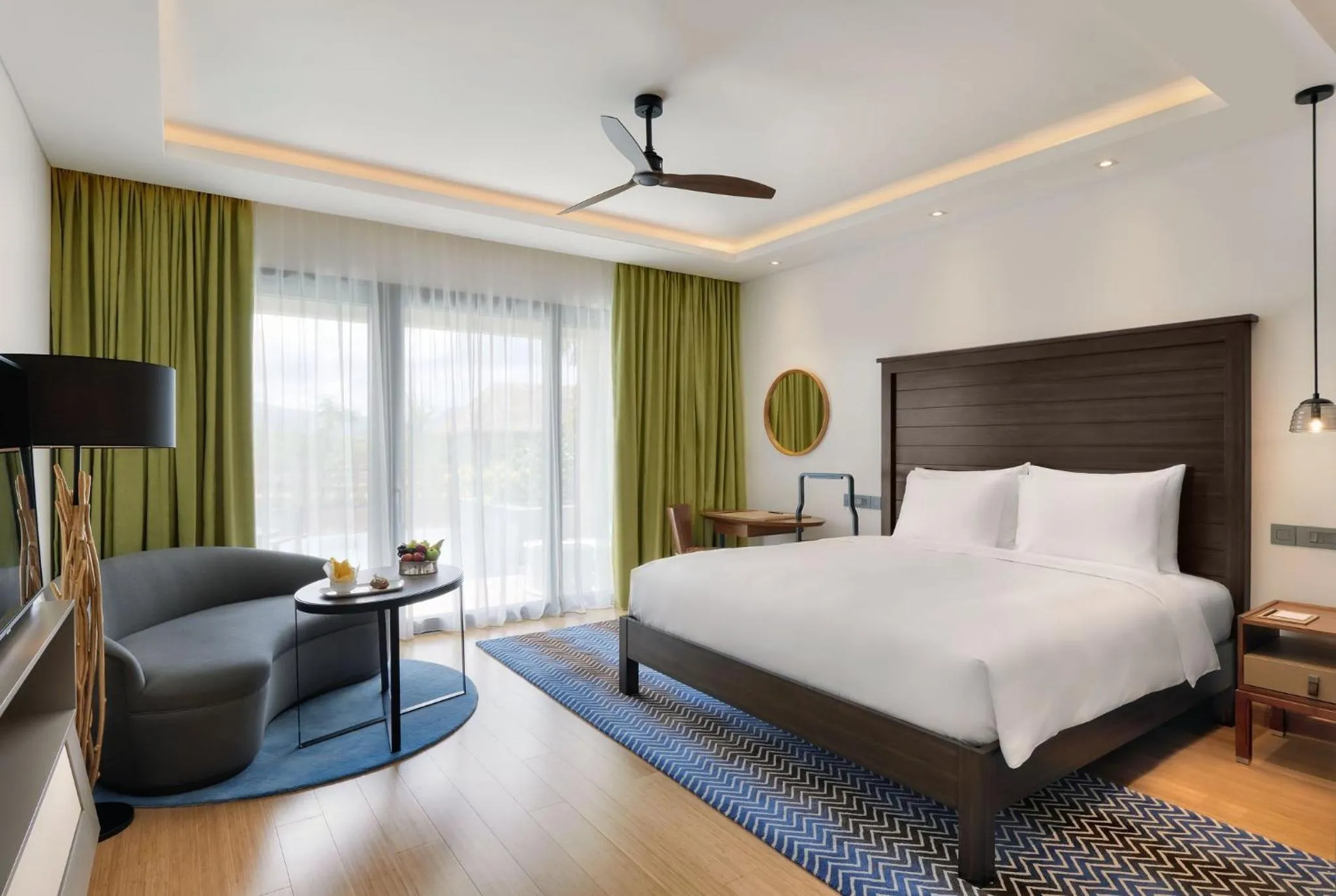 Photo of the whole room, Bed in InterContinental Dominica Cabrits Resort & Spa by IHG