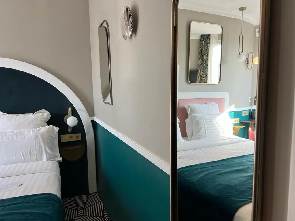 Bed in Hotel Elysa-Luxembourg