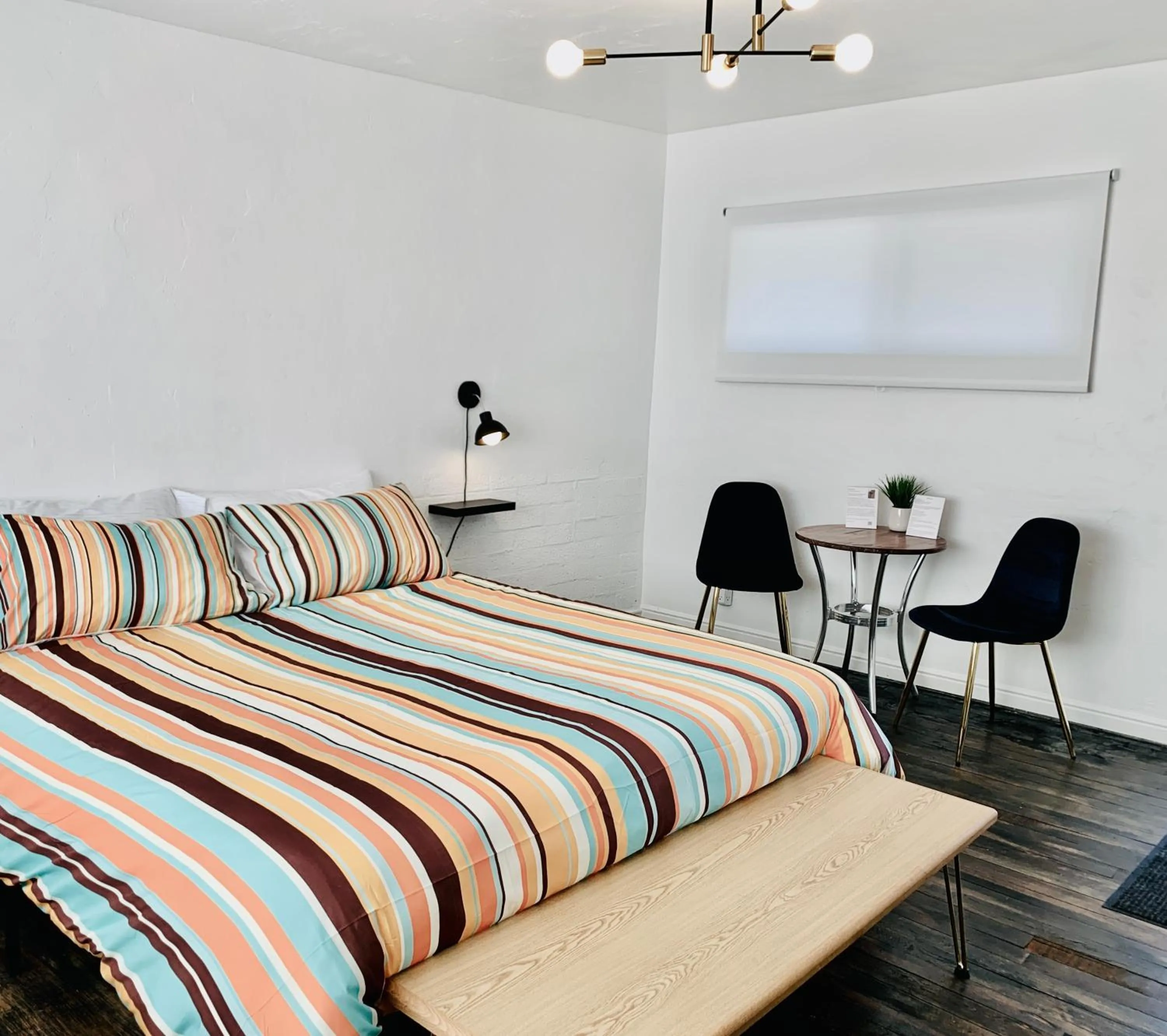 Bed in Dragonfly Motor Lodge