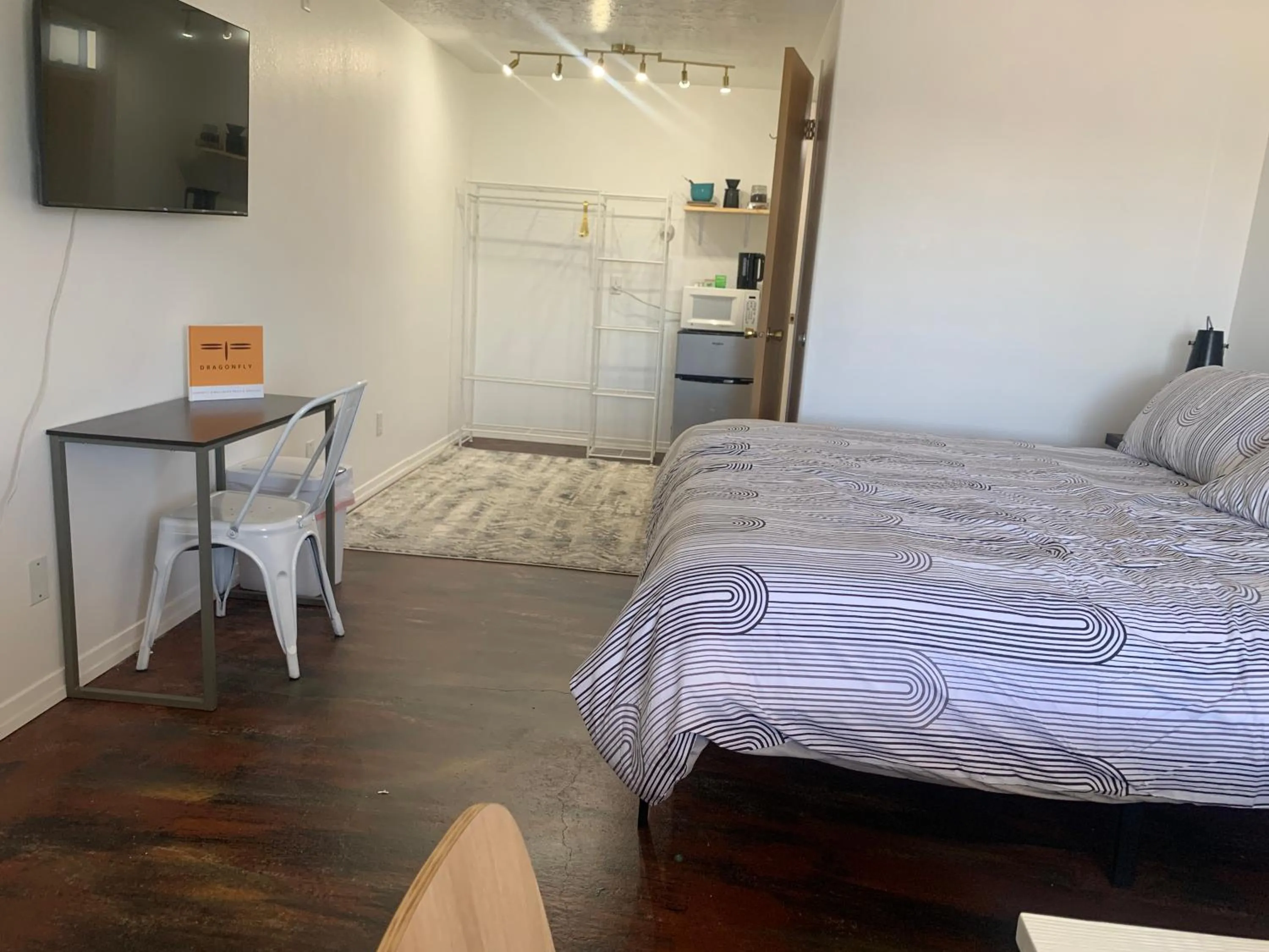 Bed in Dragonfly Motor Lodge