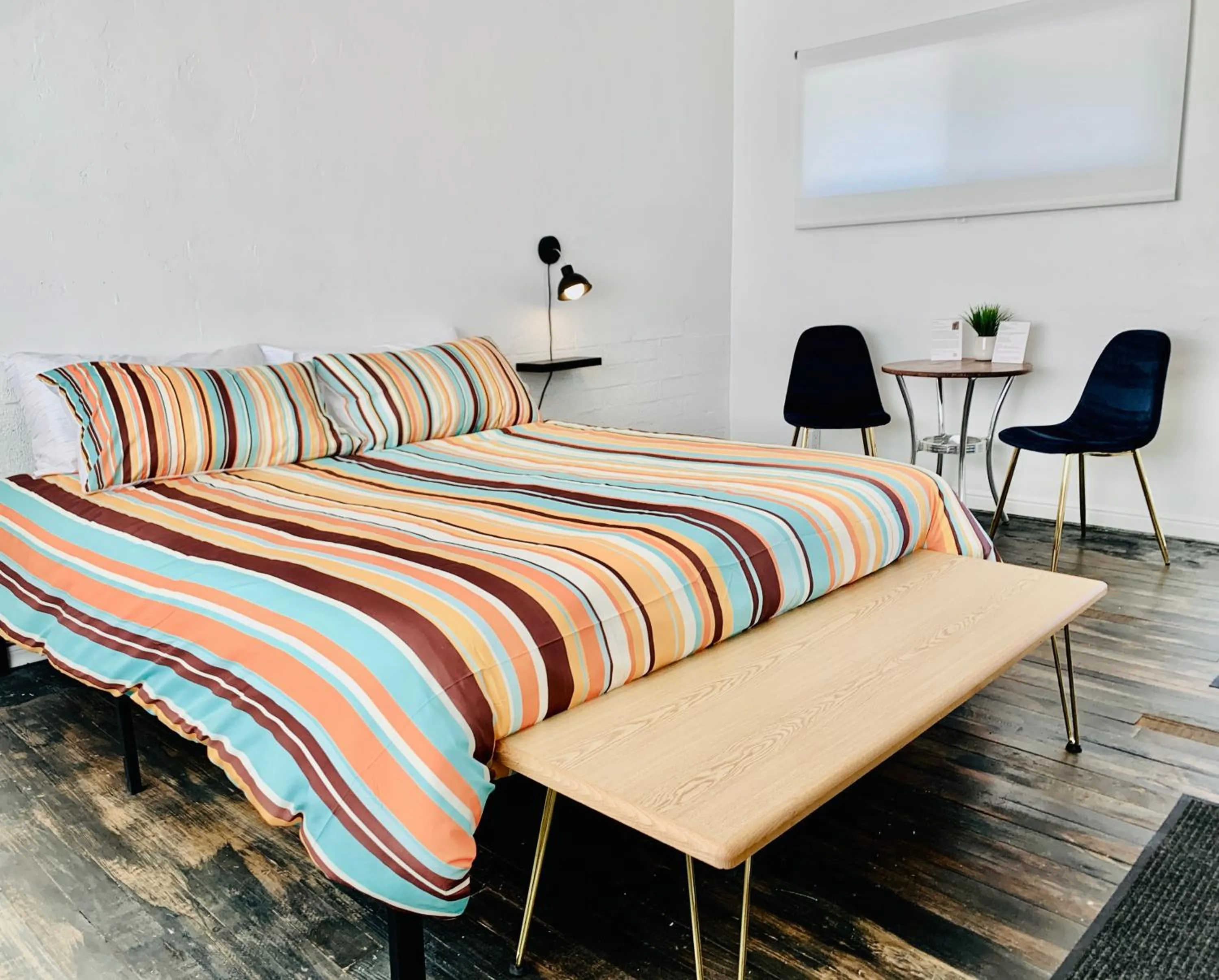 Bed in Dragonfly Motor Lodge