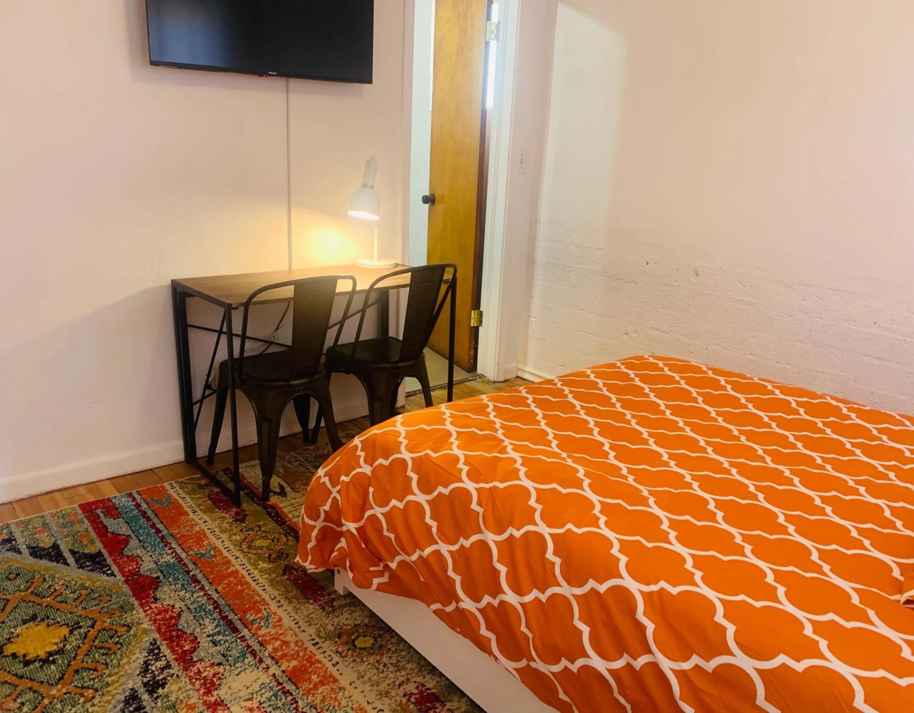 Bed in Dragonfly Motor Lodge