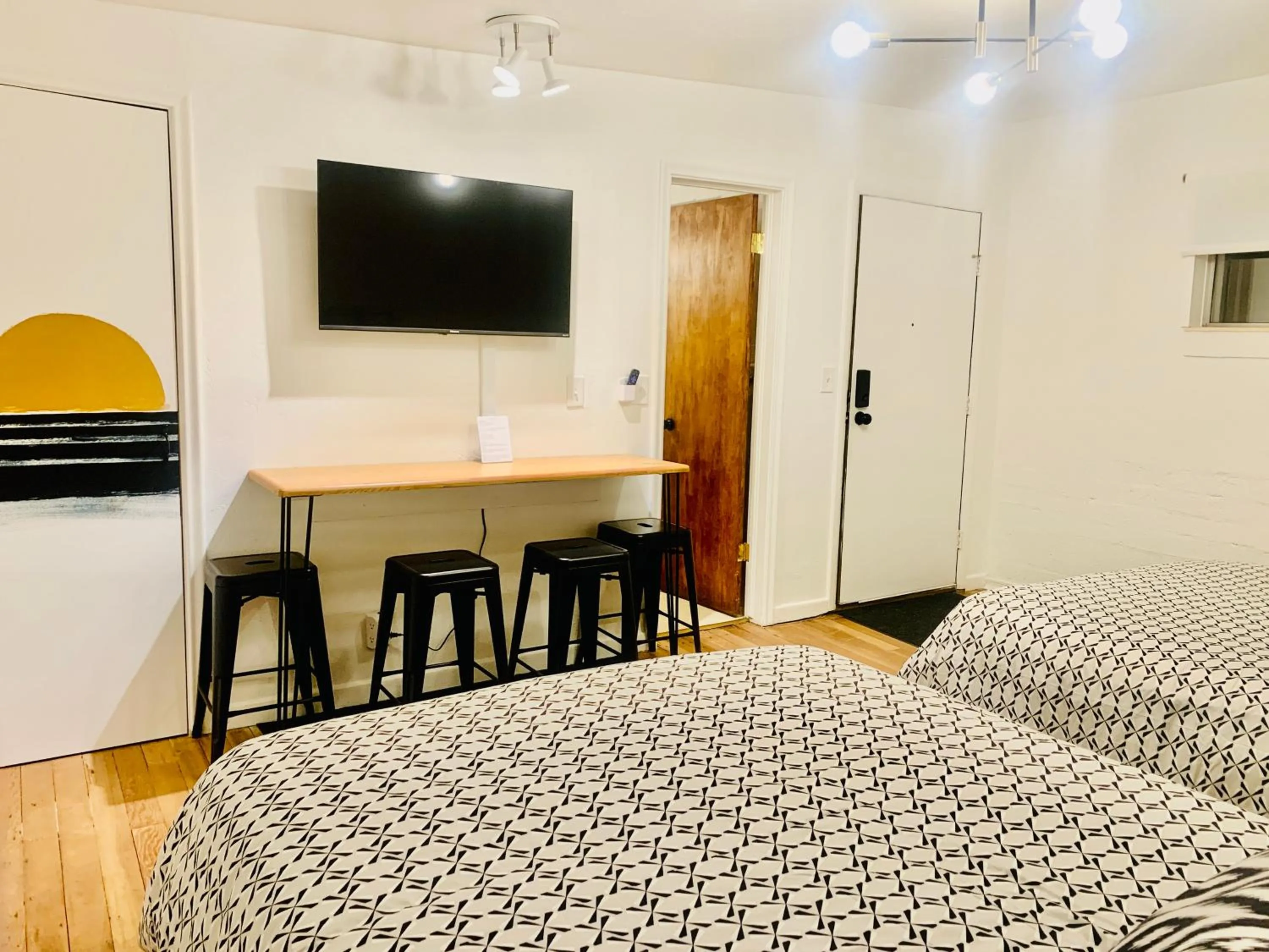 Bed in Dragonfly Motor Lodge