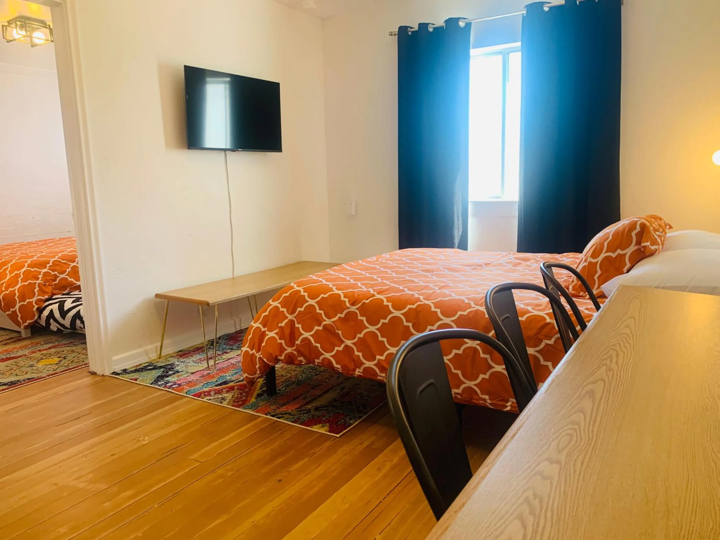 Bed in Dragonfly Motor Lodge