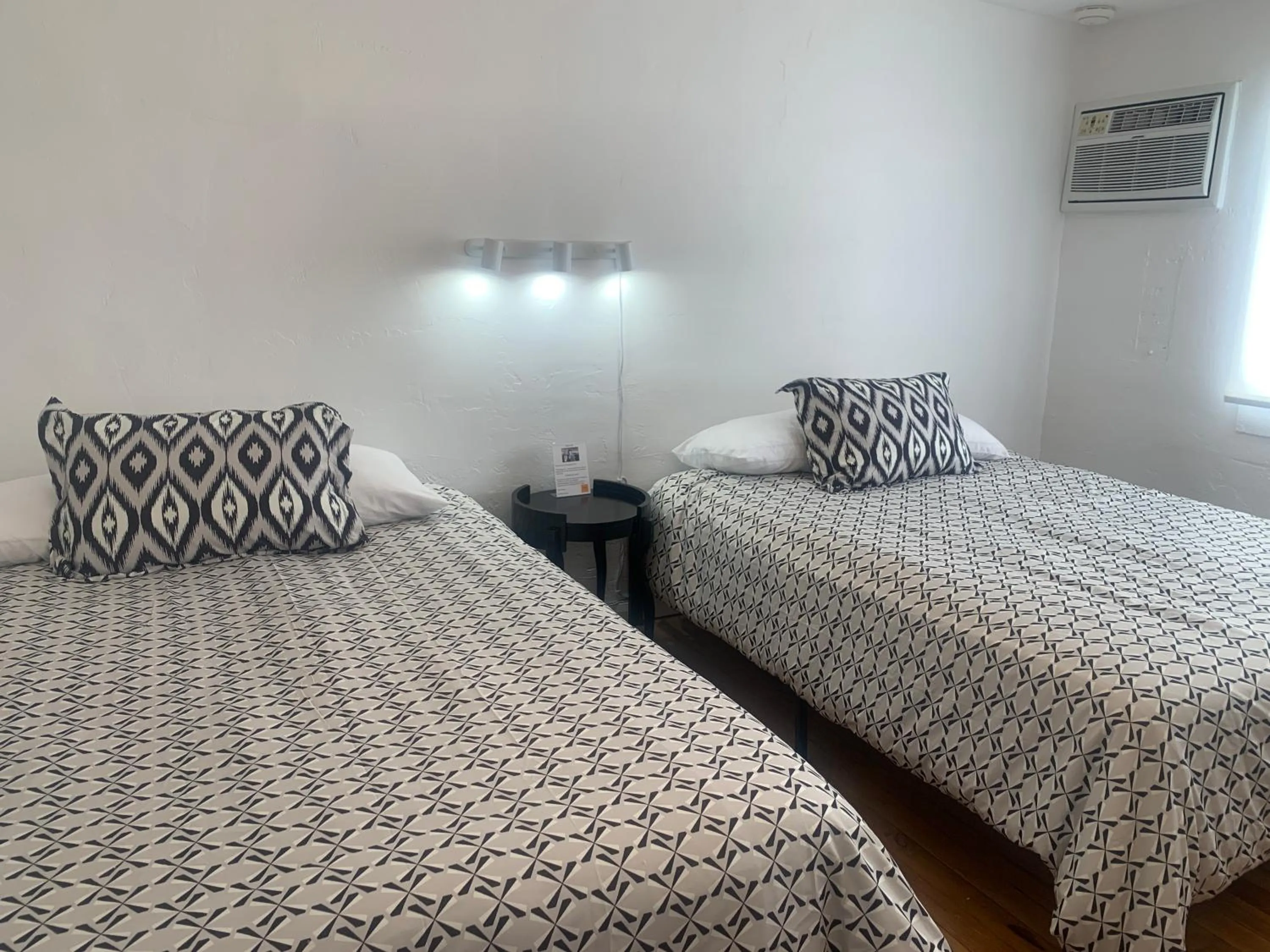 Bed in Dragonfly Motor Lodge