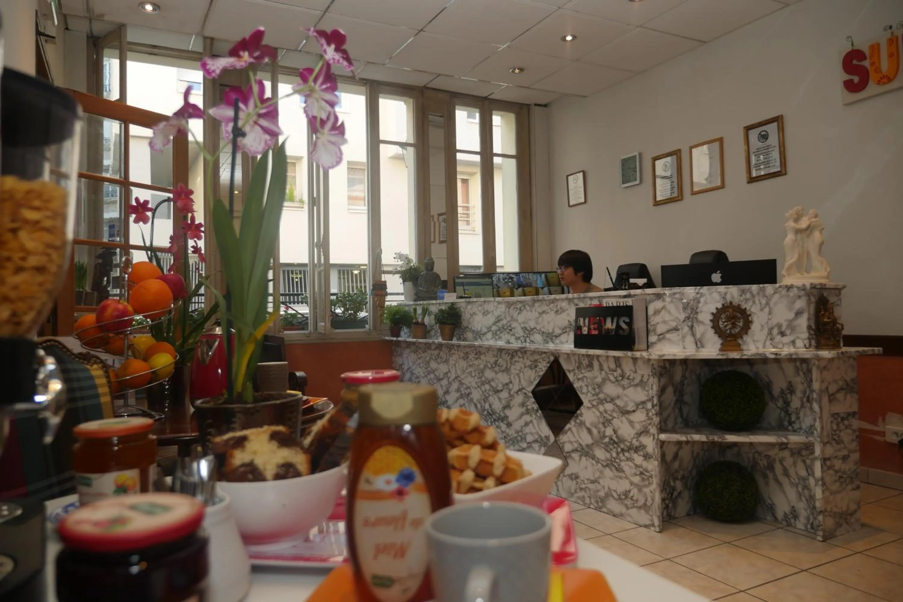 Property building in Hotel Novex Paris