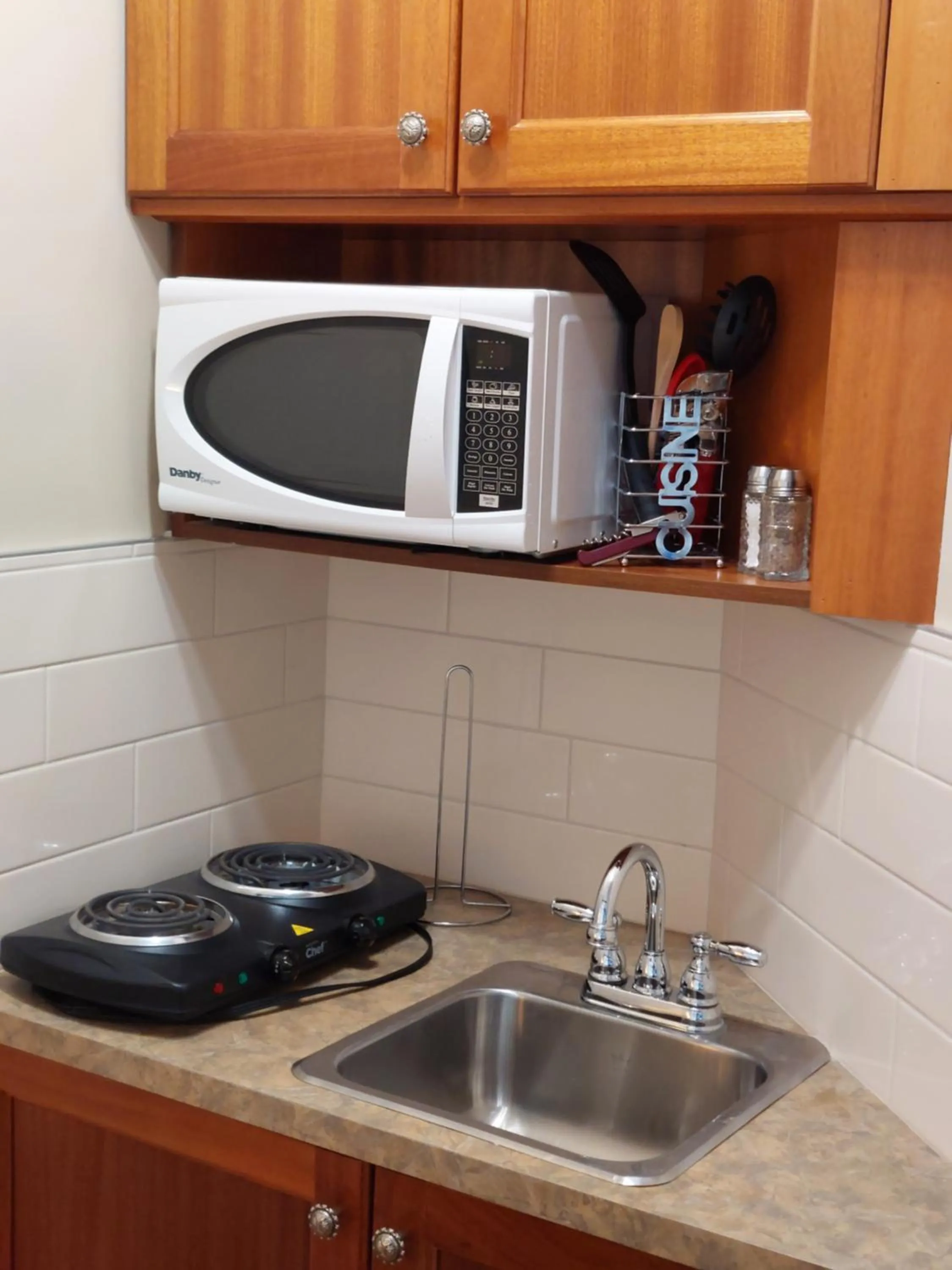 Kitchen or kitchenette in Studio-hôtel Villegiature Saint-Sauveur