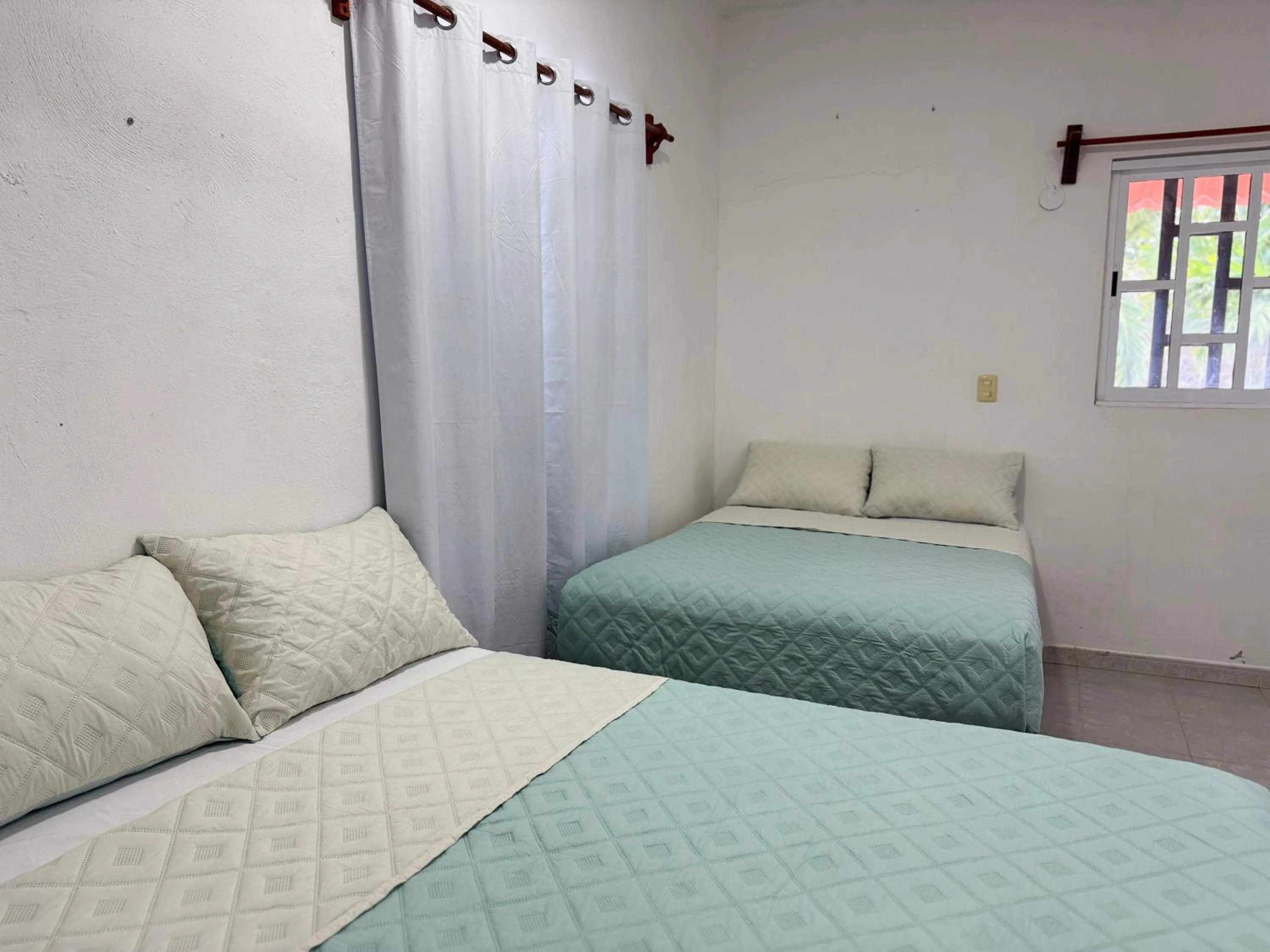 Bed in Zayali Bacalar - Guest House