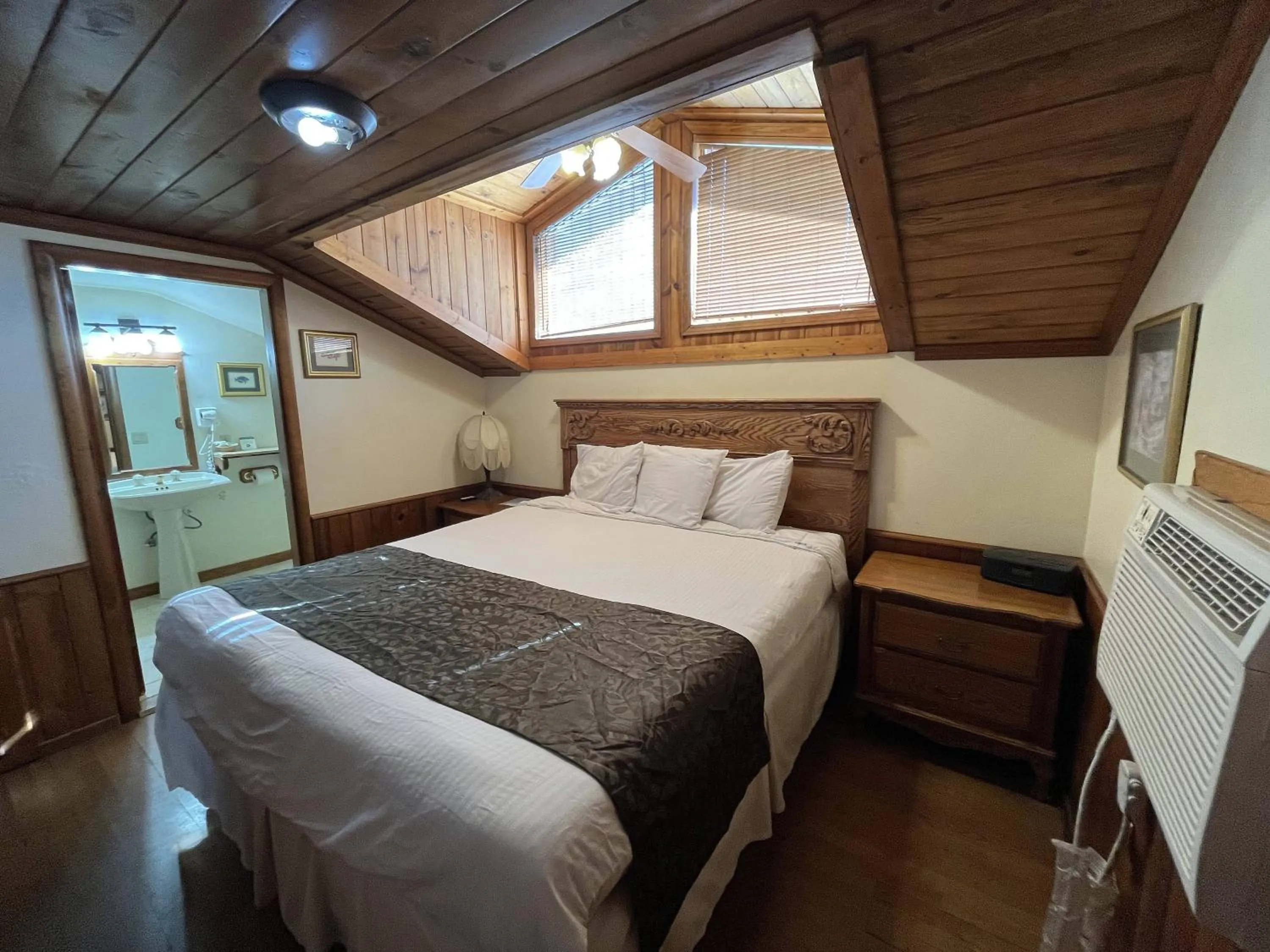 Bed in Whispering Pines Lodge