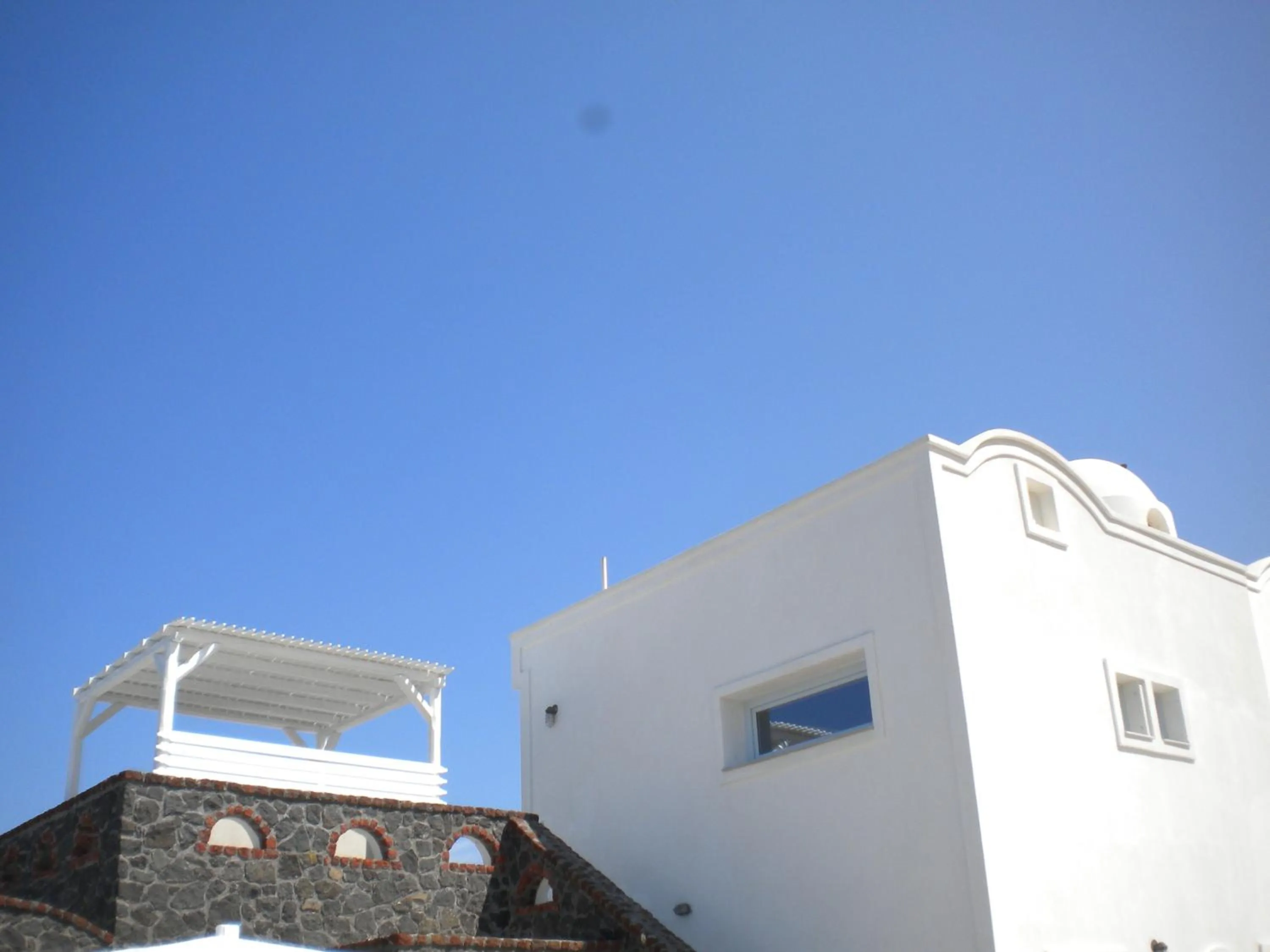 Property building in Starlight Luxury Seaside Villa & Suites