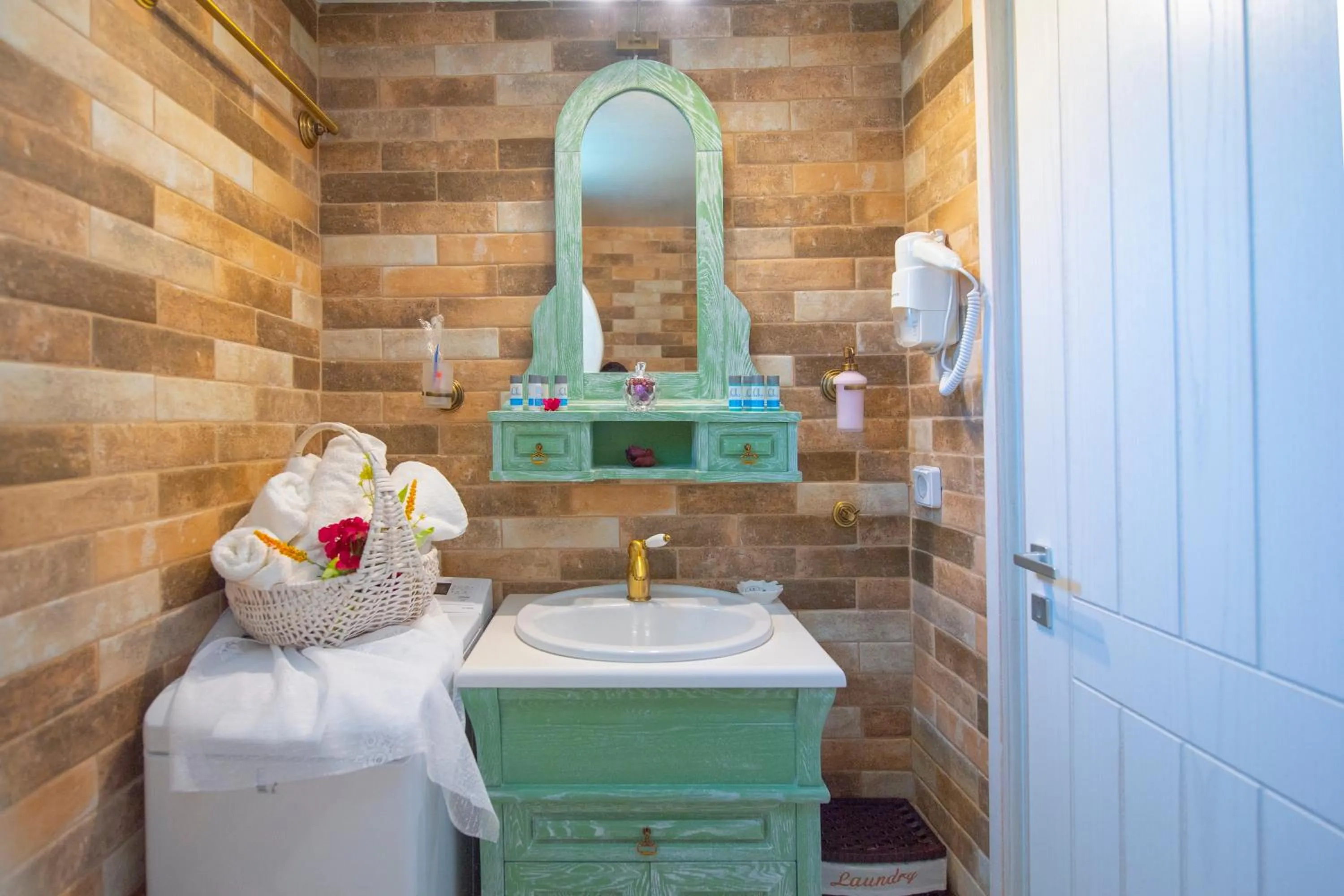 Toilet in Starlight Luxury Seaside Villa & Suites