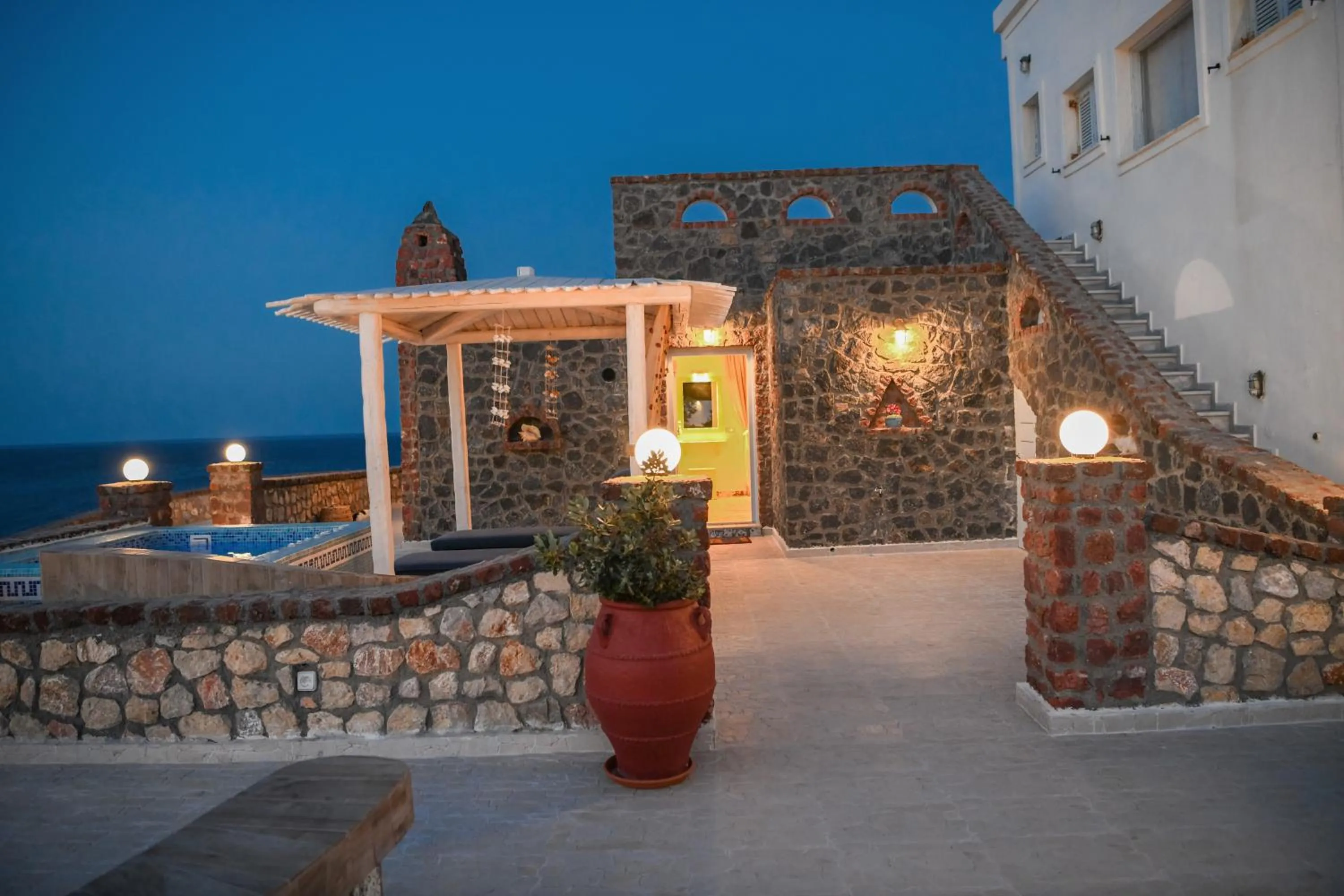 Patio in Starlight Luxury Seaside Villa & Suites