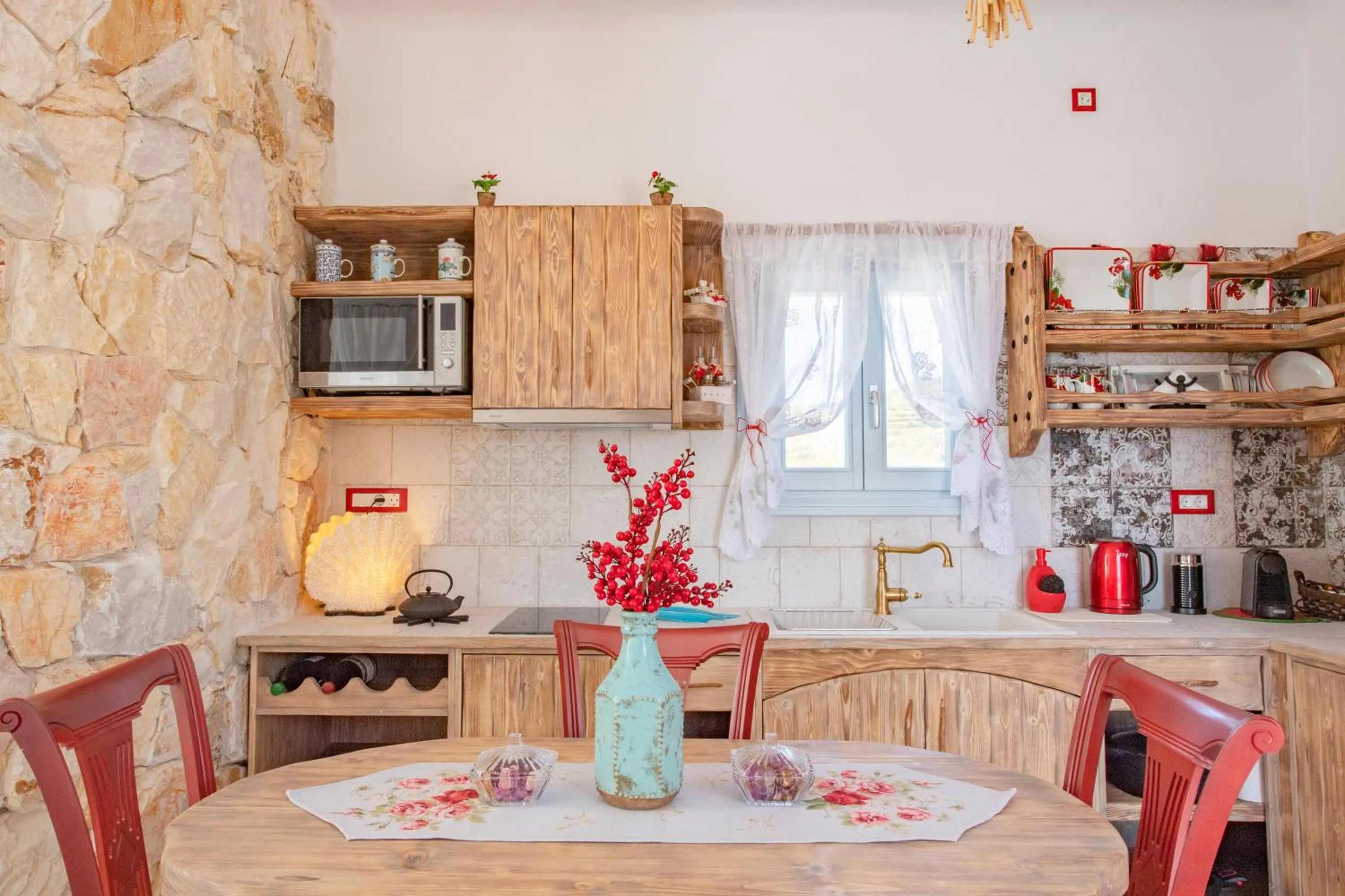 Kitchen or kitchenette in Starlight Luxury Seaside Villa & Suites