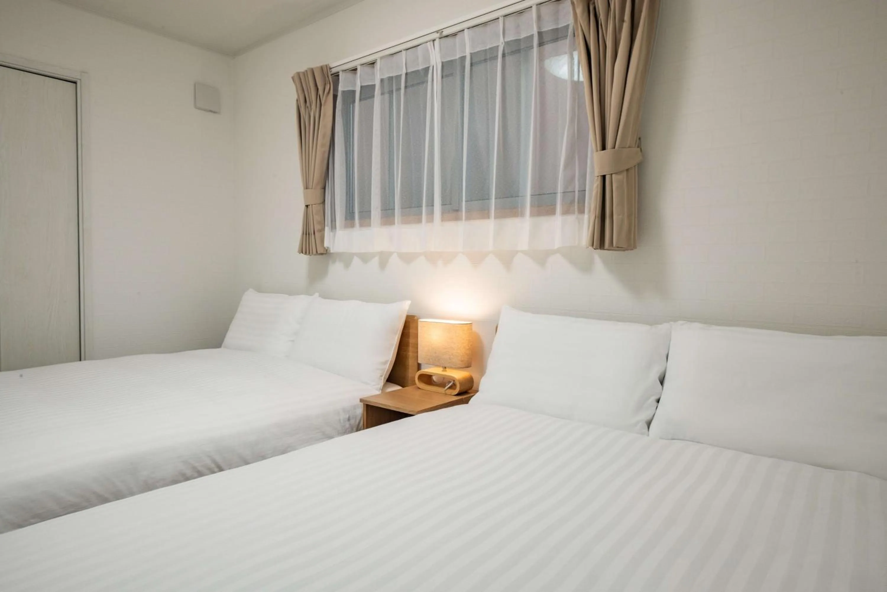 Bed in H2O Stay Ikebukuro