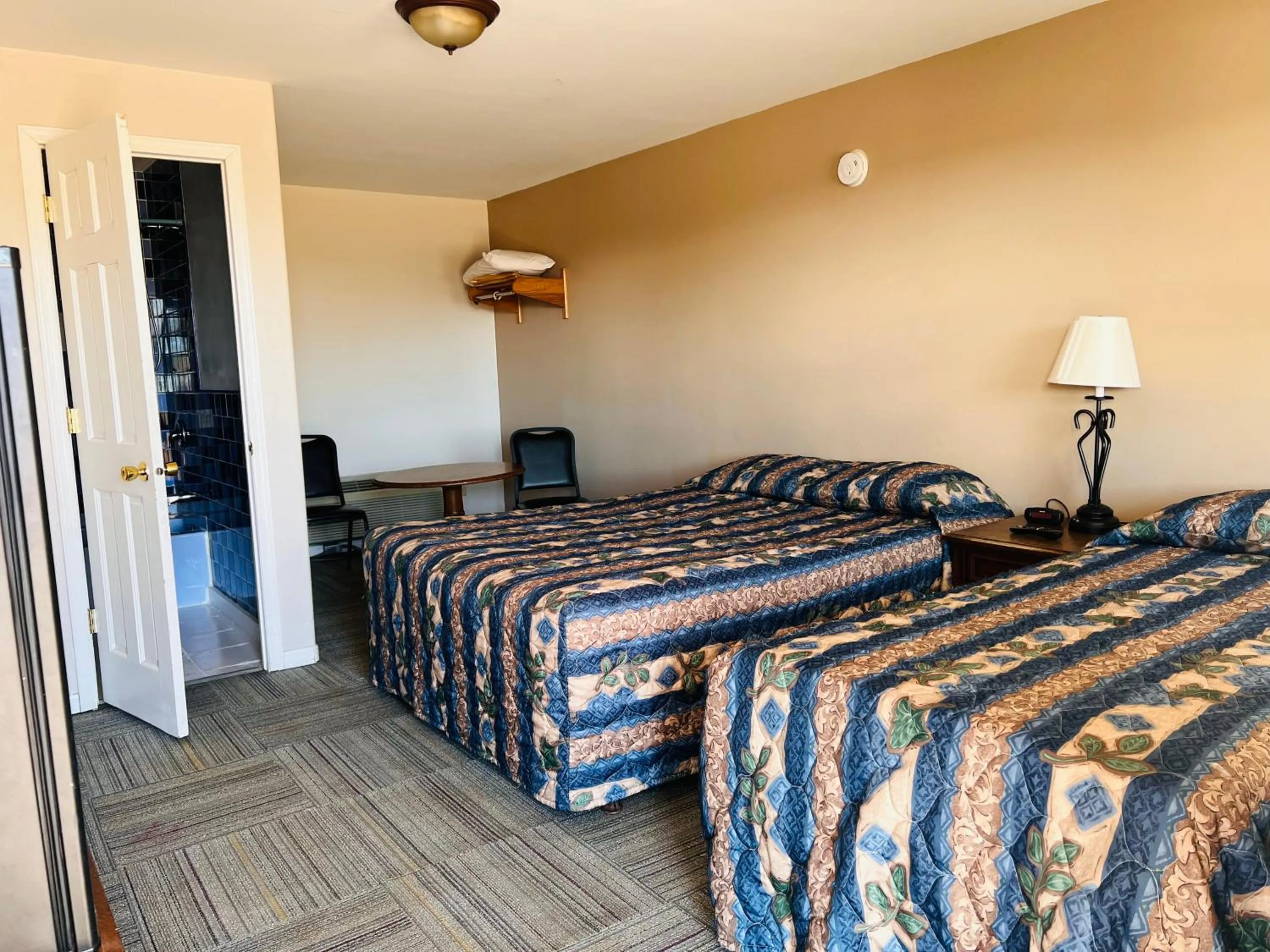 Bedroom, Bed in Dew Drop Inn Motel by OYO Miller SD