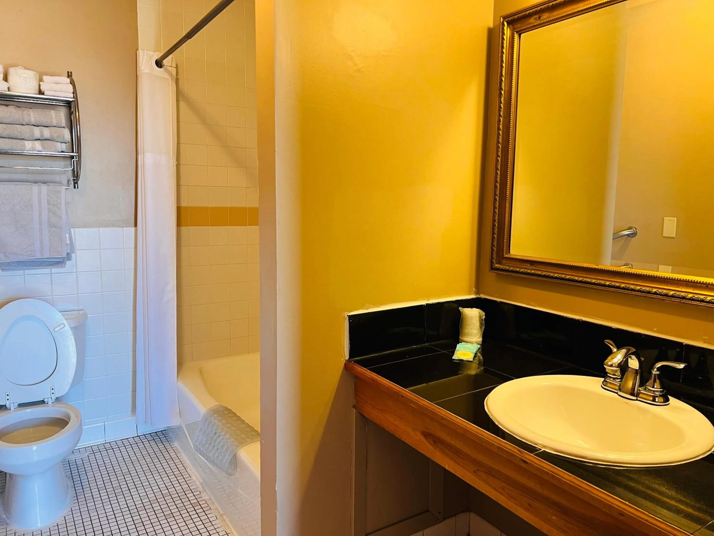 Bathroom in Dew Drop Inn Motel by OYO Miller SD