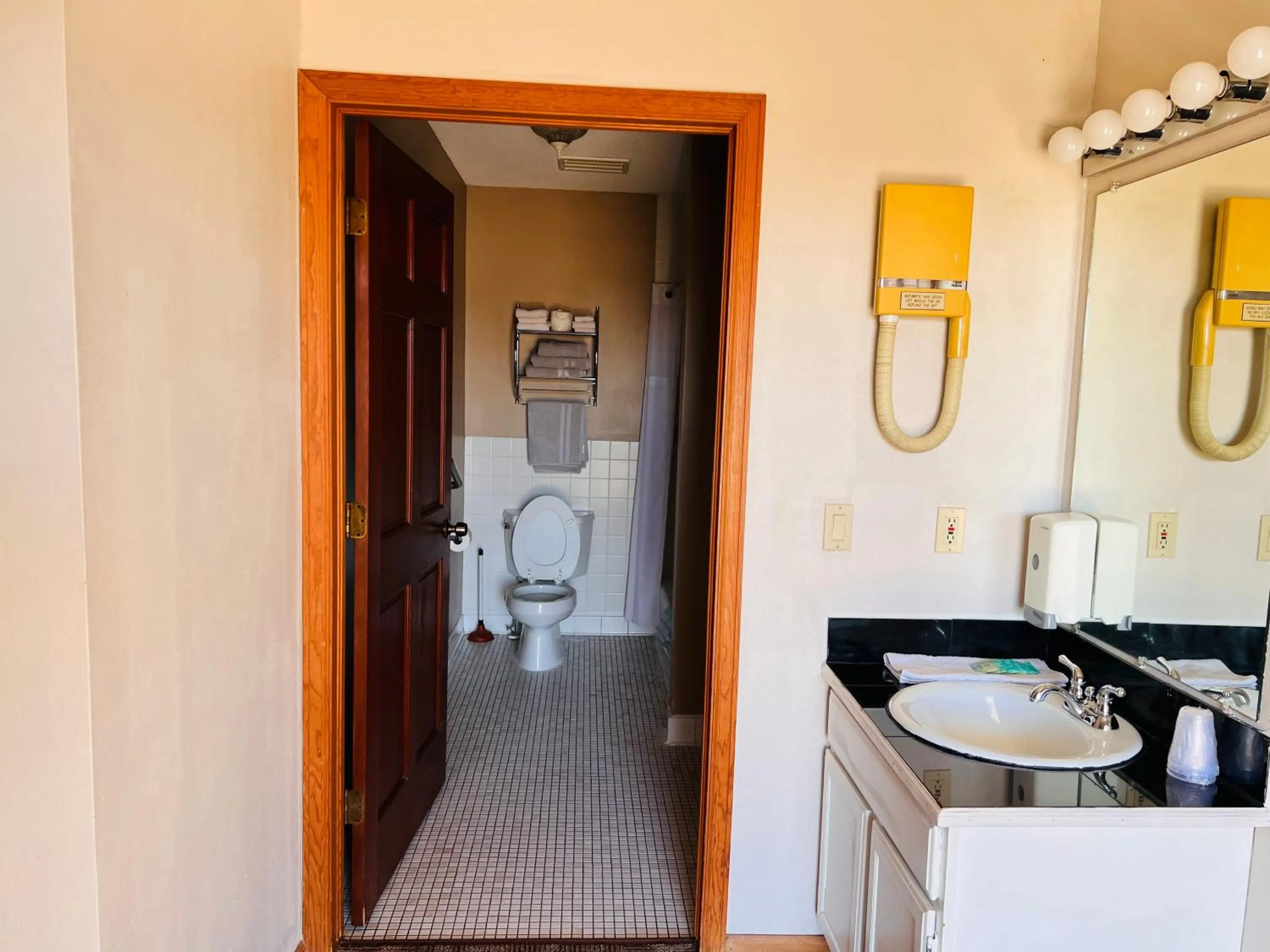 Bathroom in Dew Drop Inn Motel by OYO Miller SD