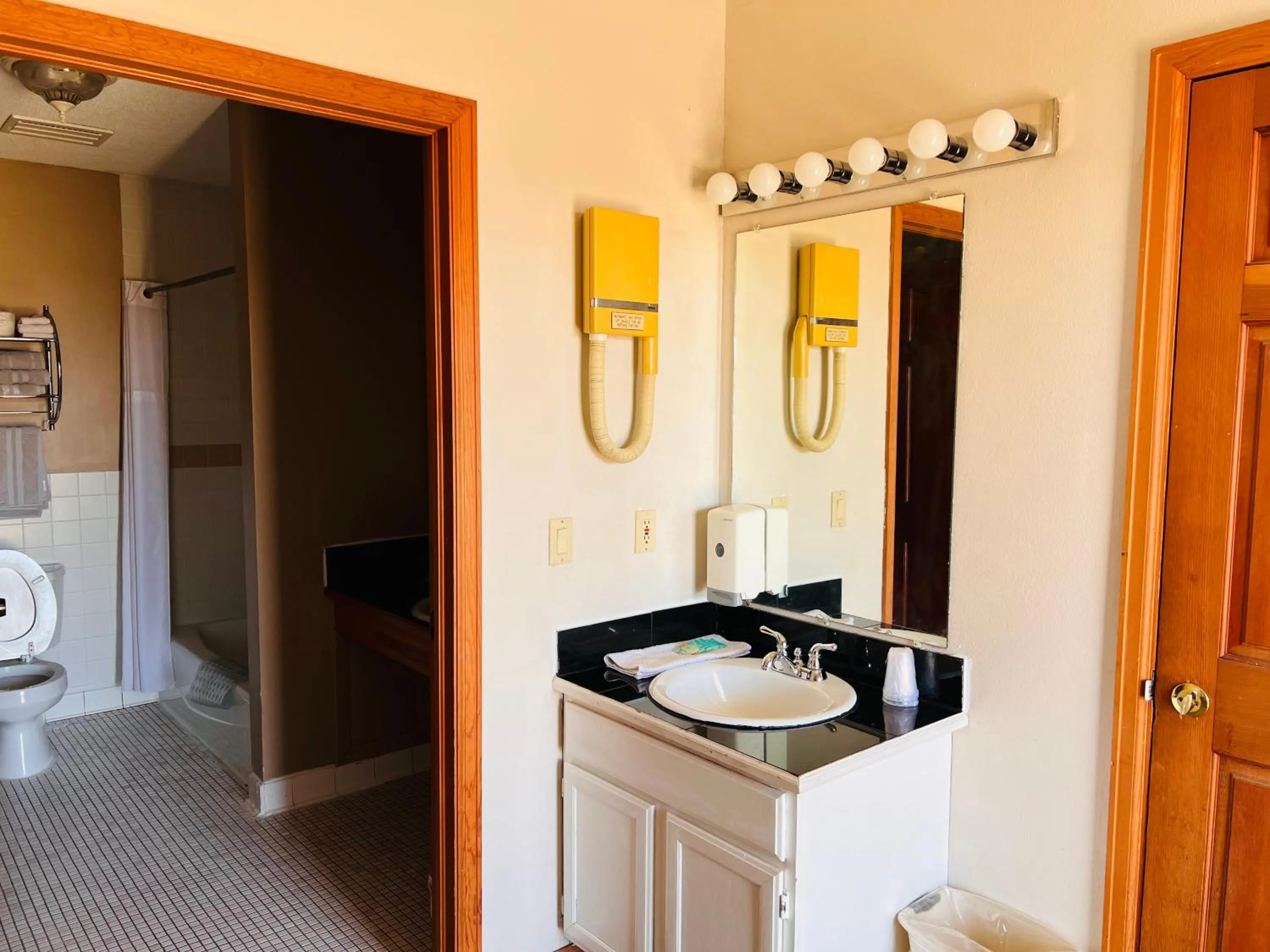 Bathroom in Dew Drop Inn Motel by OYO Miller SD