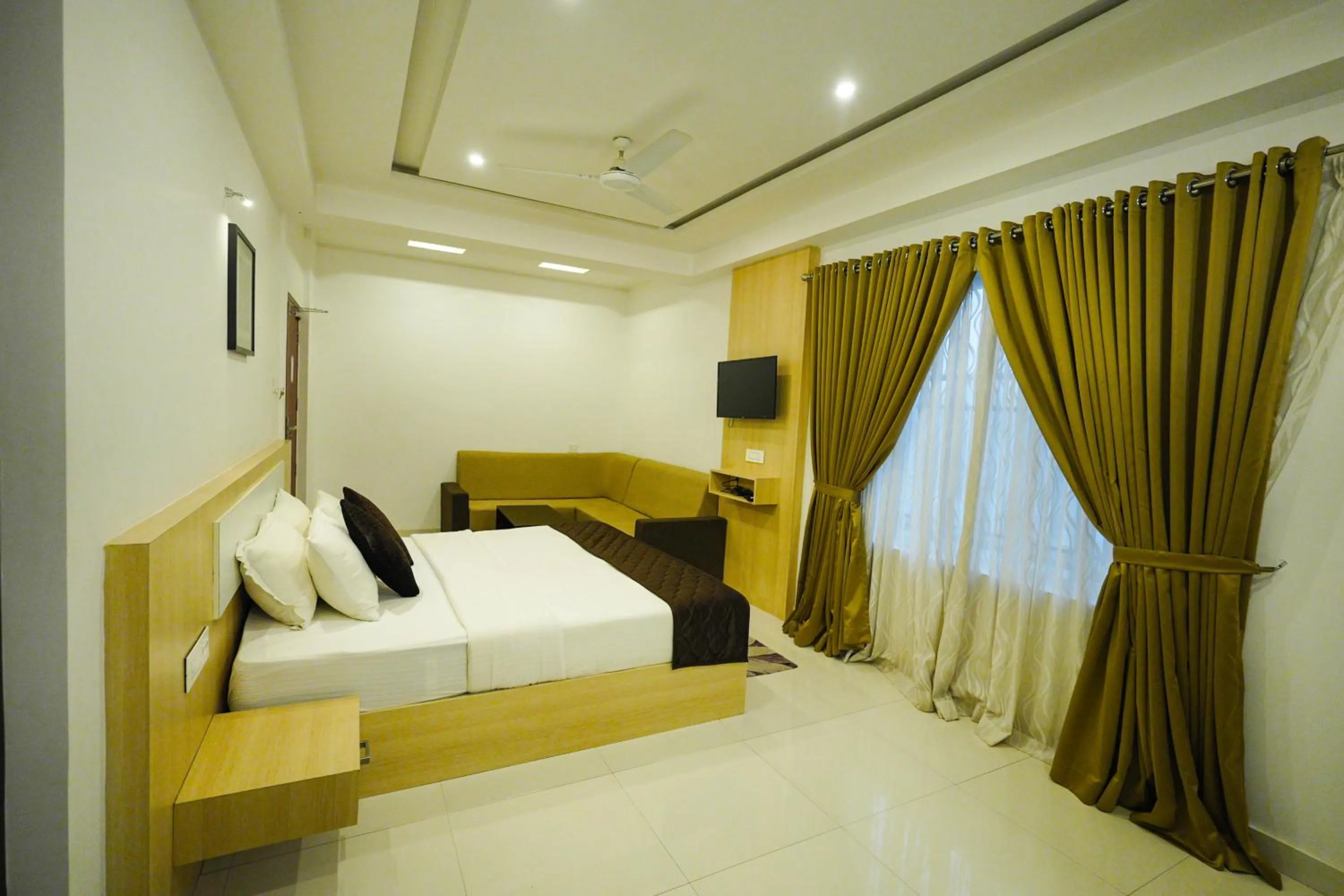 Bed in Athirappilly Rainland Resort