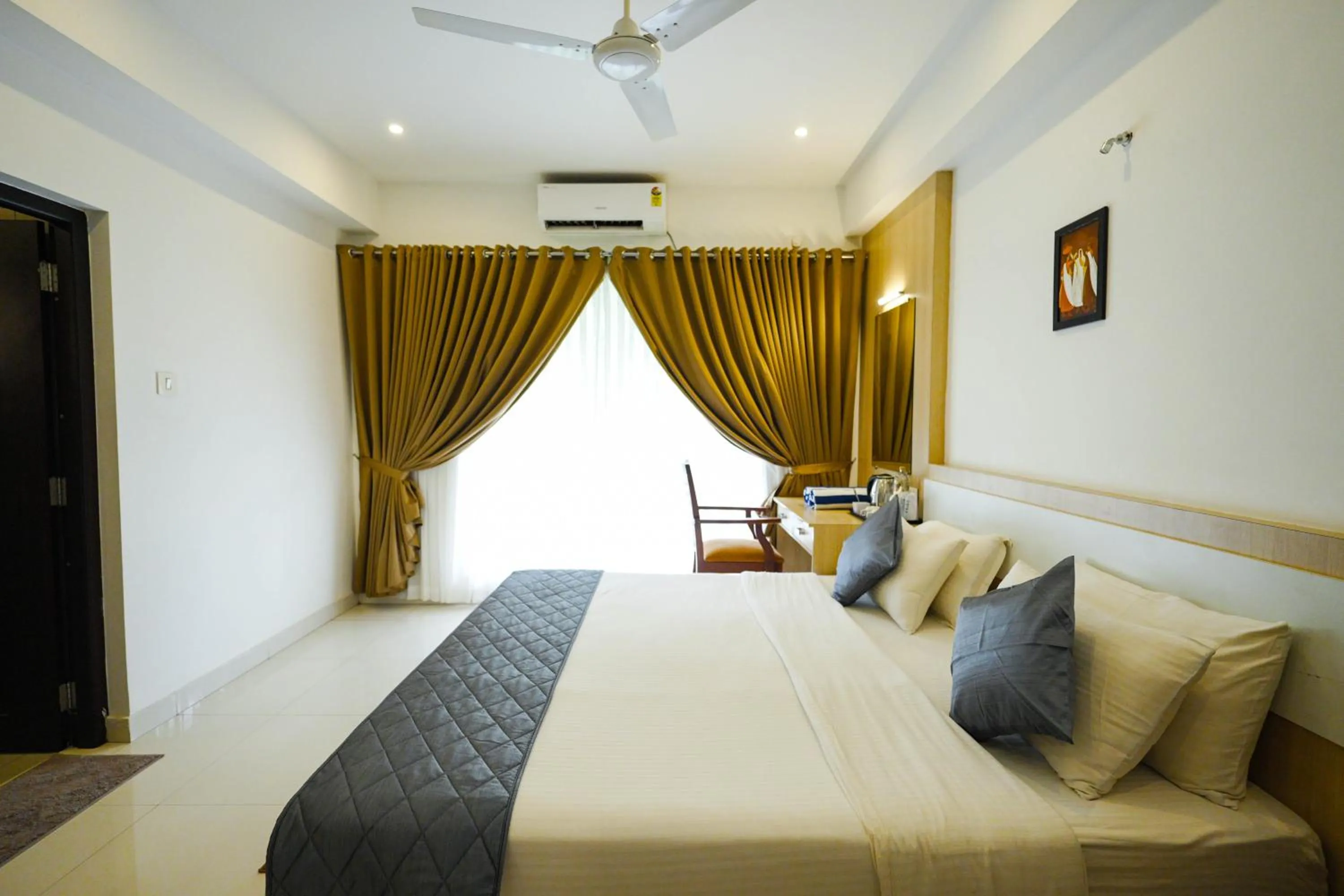 Bed in Athirappilly Rainland Resort