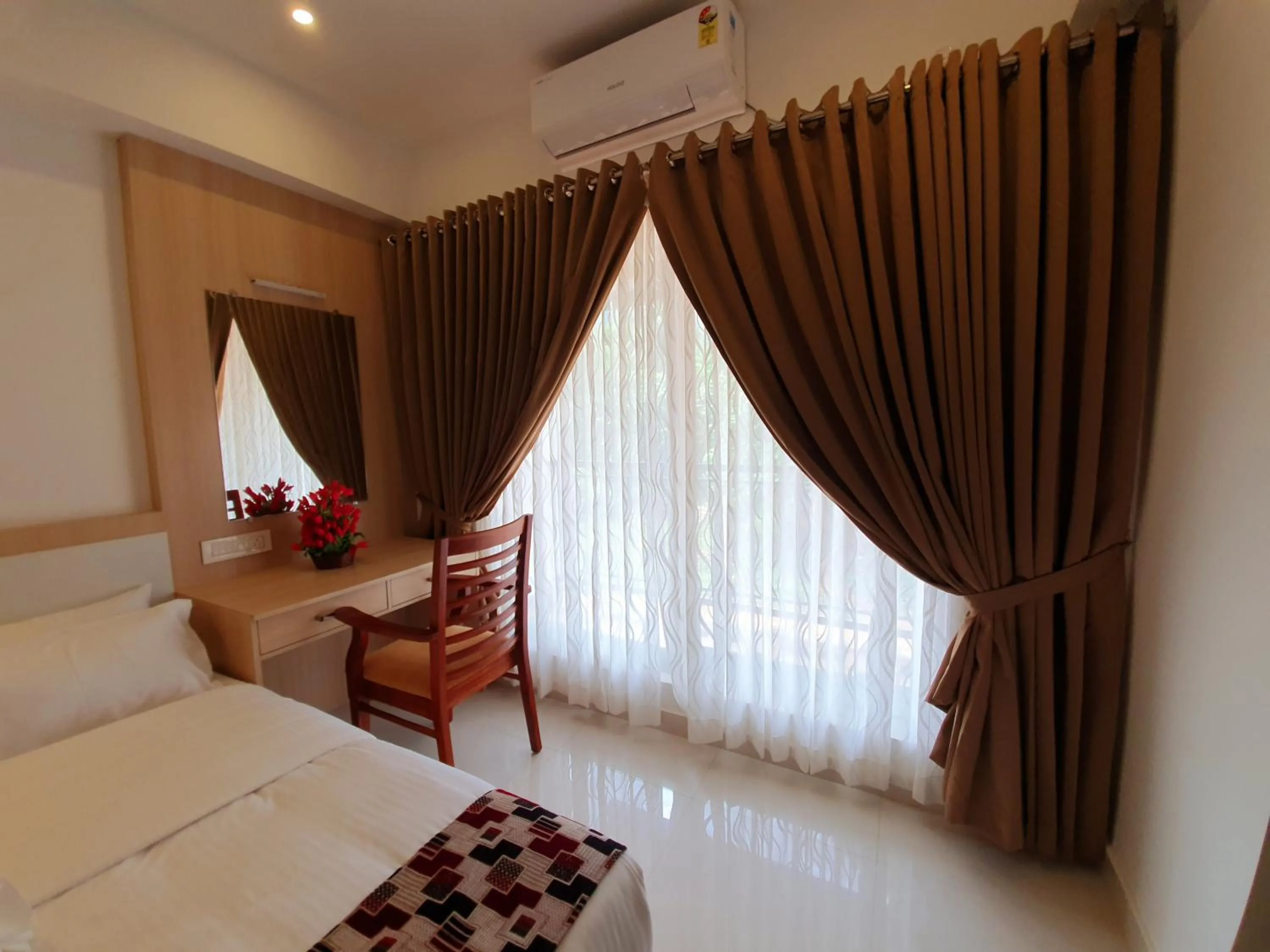 Bedroom, Bed in Athirappilly Rainland Resort