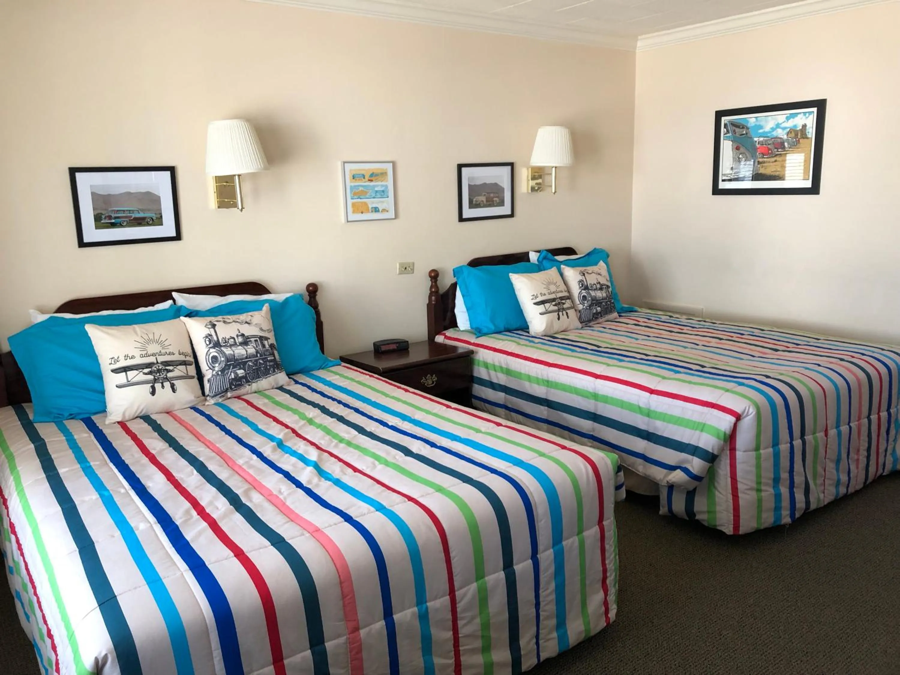 Bed in Mansion House Motel