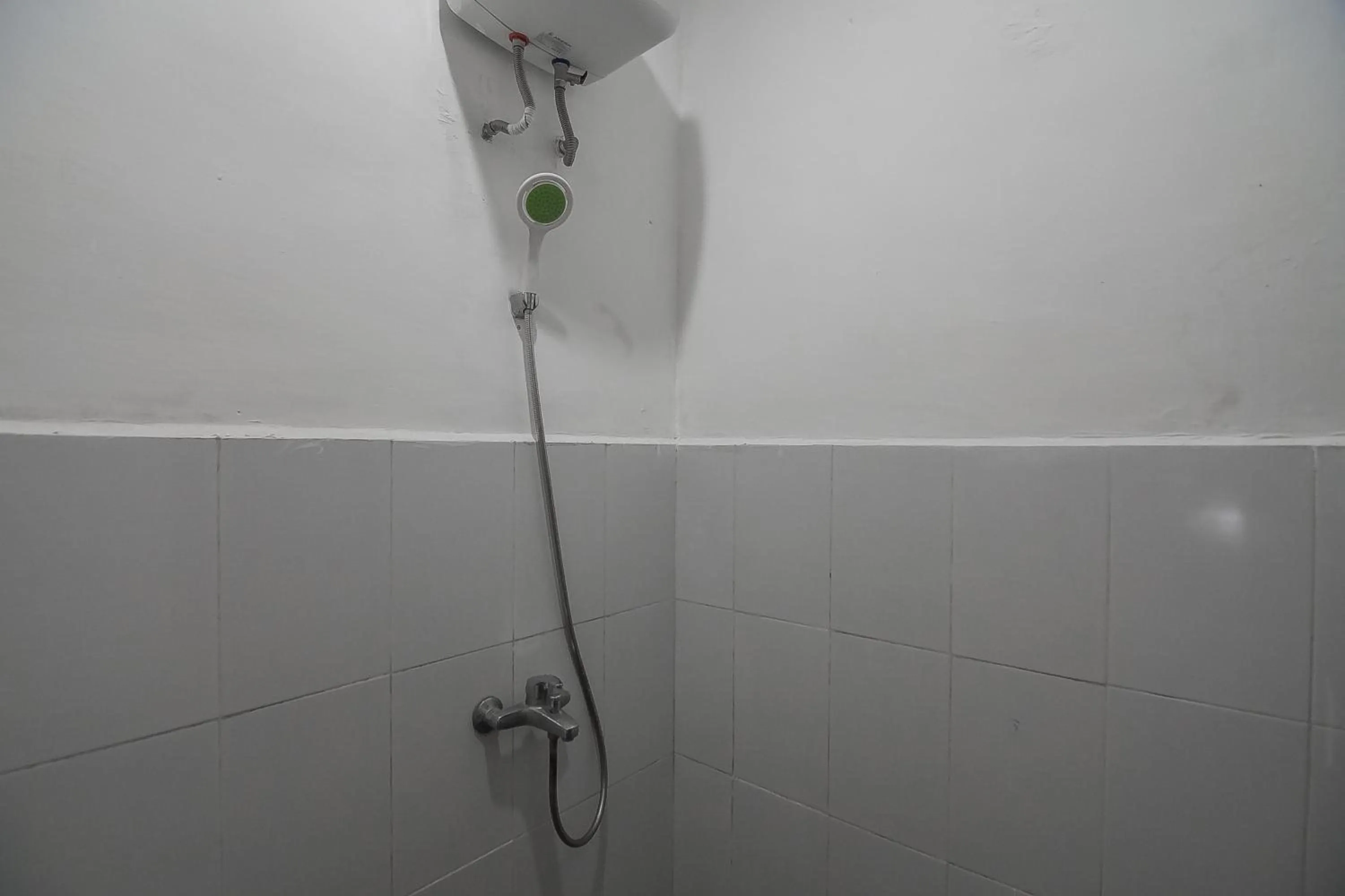 Bathroom in RedDoorz Plus near Cambridge City Square 2 Medan