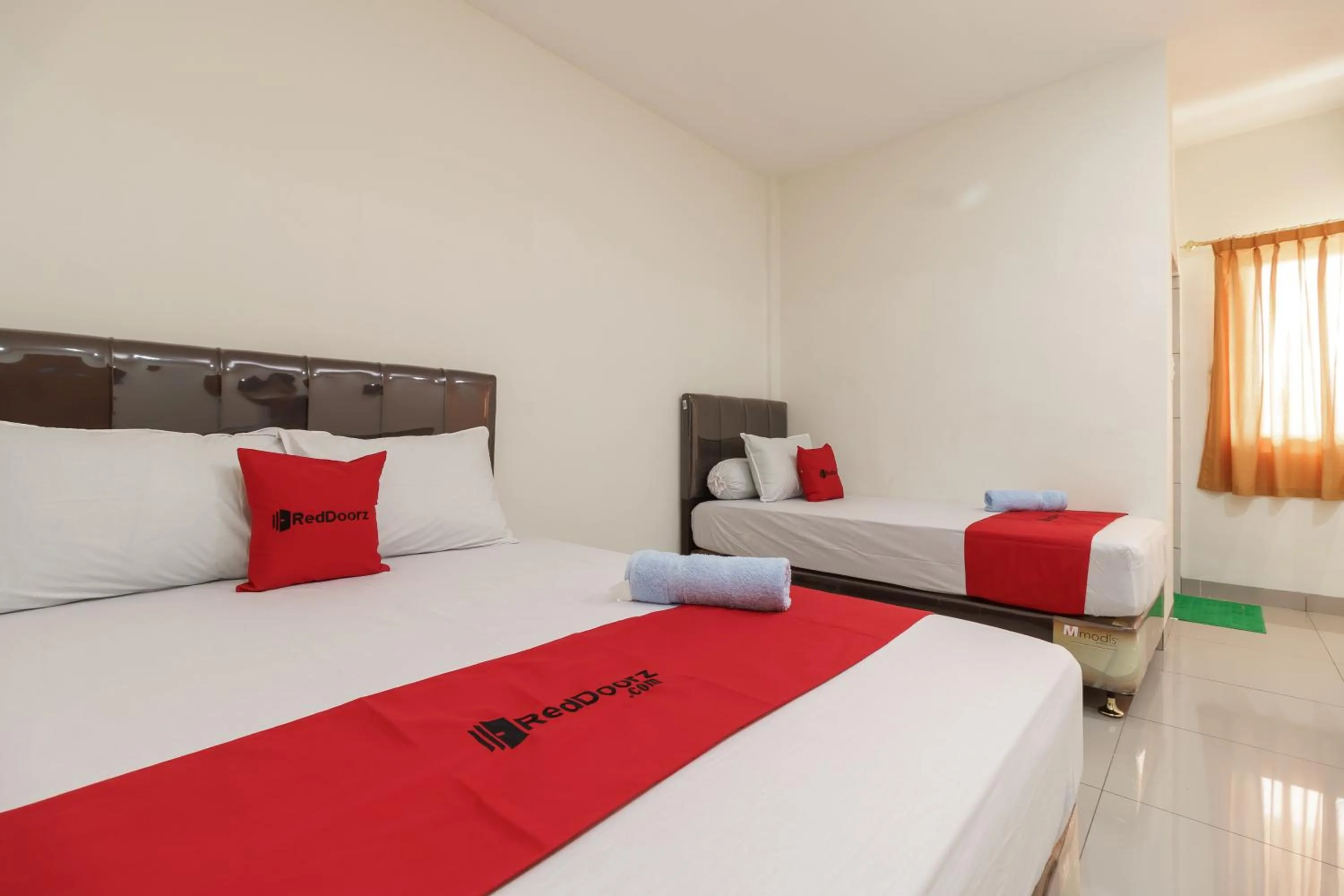 Bedroom in RedDoorz Syariah near Universitas Serambi Mekkah