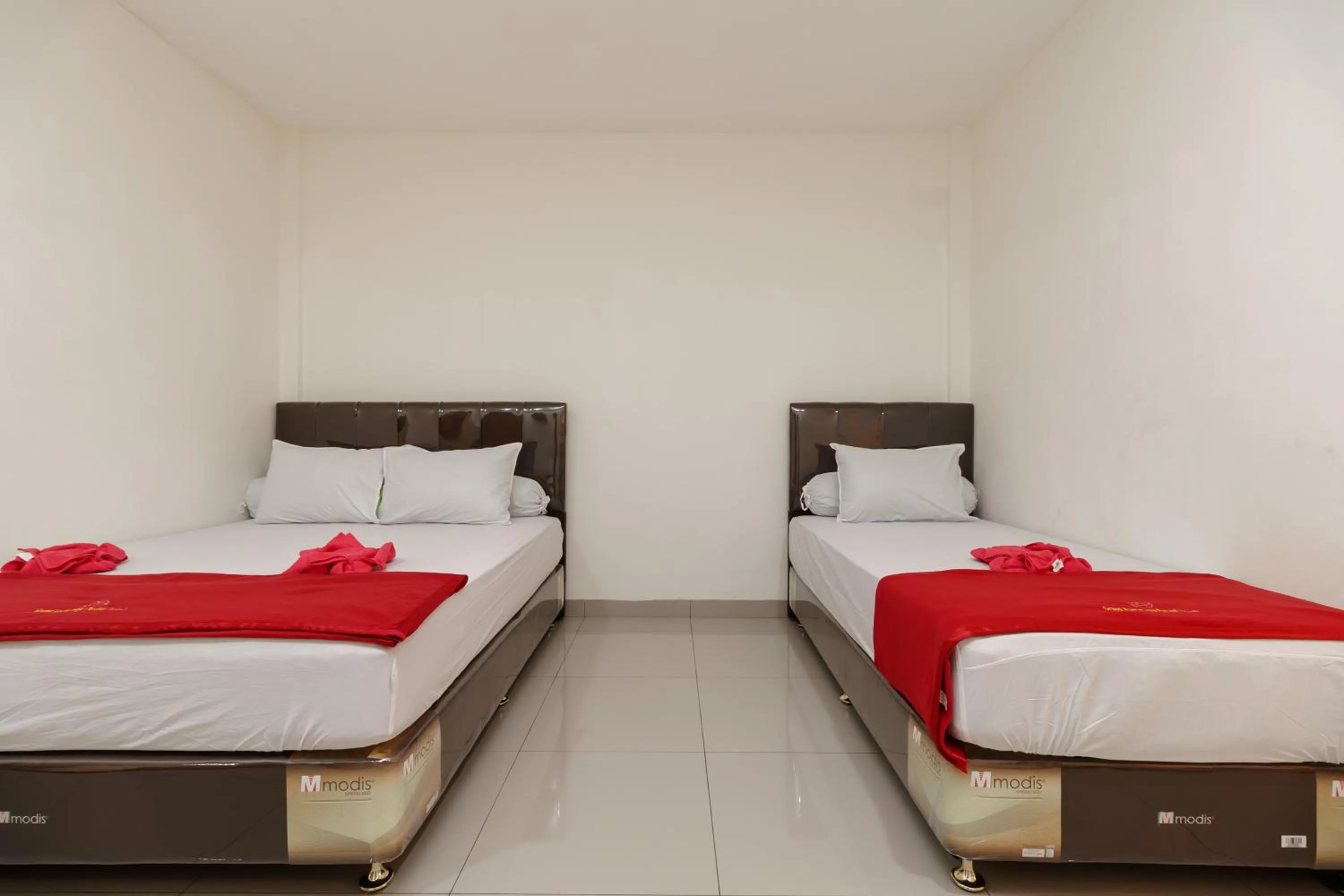 Bedroom in RedDoorz Syariah near Universitas Serambi Mekkah