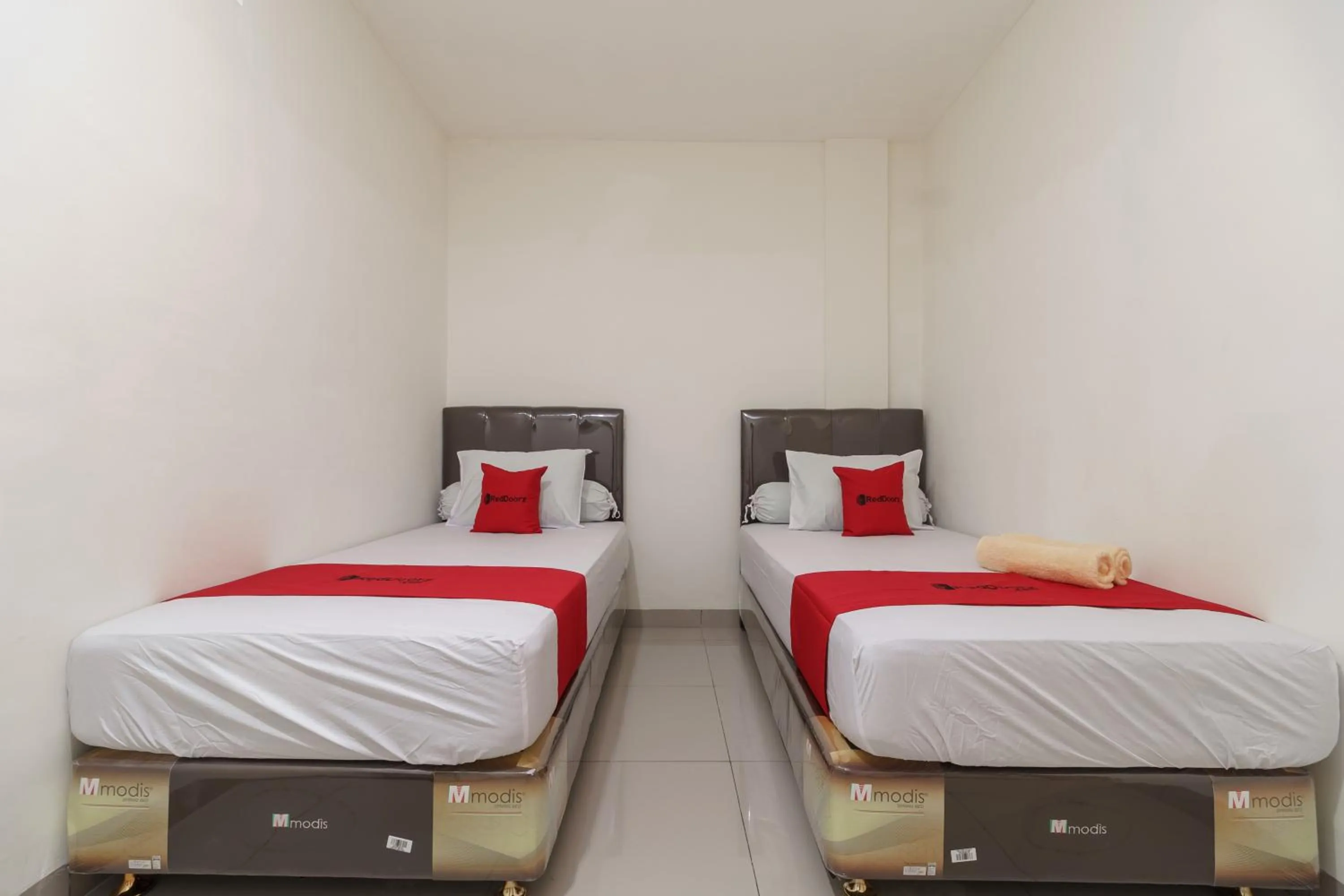 Bedroom in RedDoorz Syariah near Universitas Serambi Mekkah