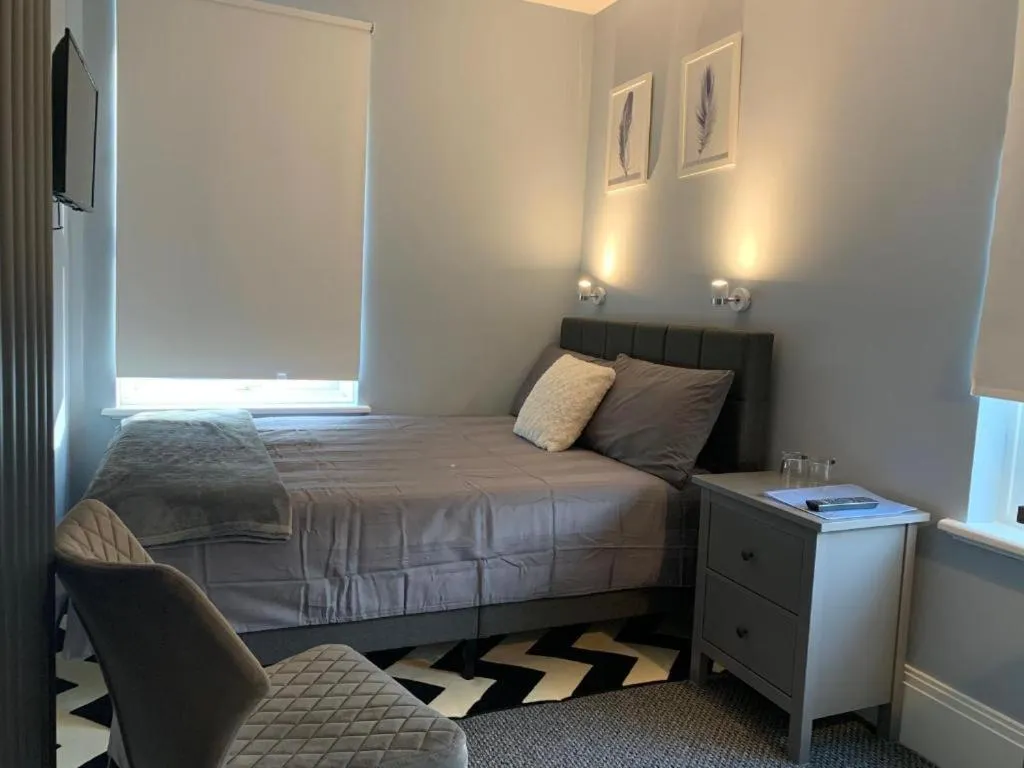 Bedroom in OYO Ruby Pub & Hotel