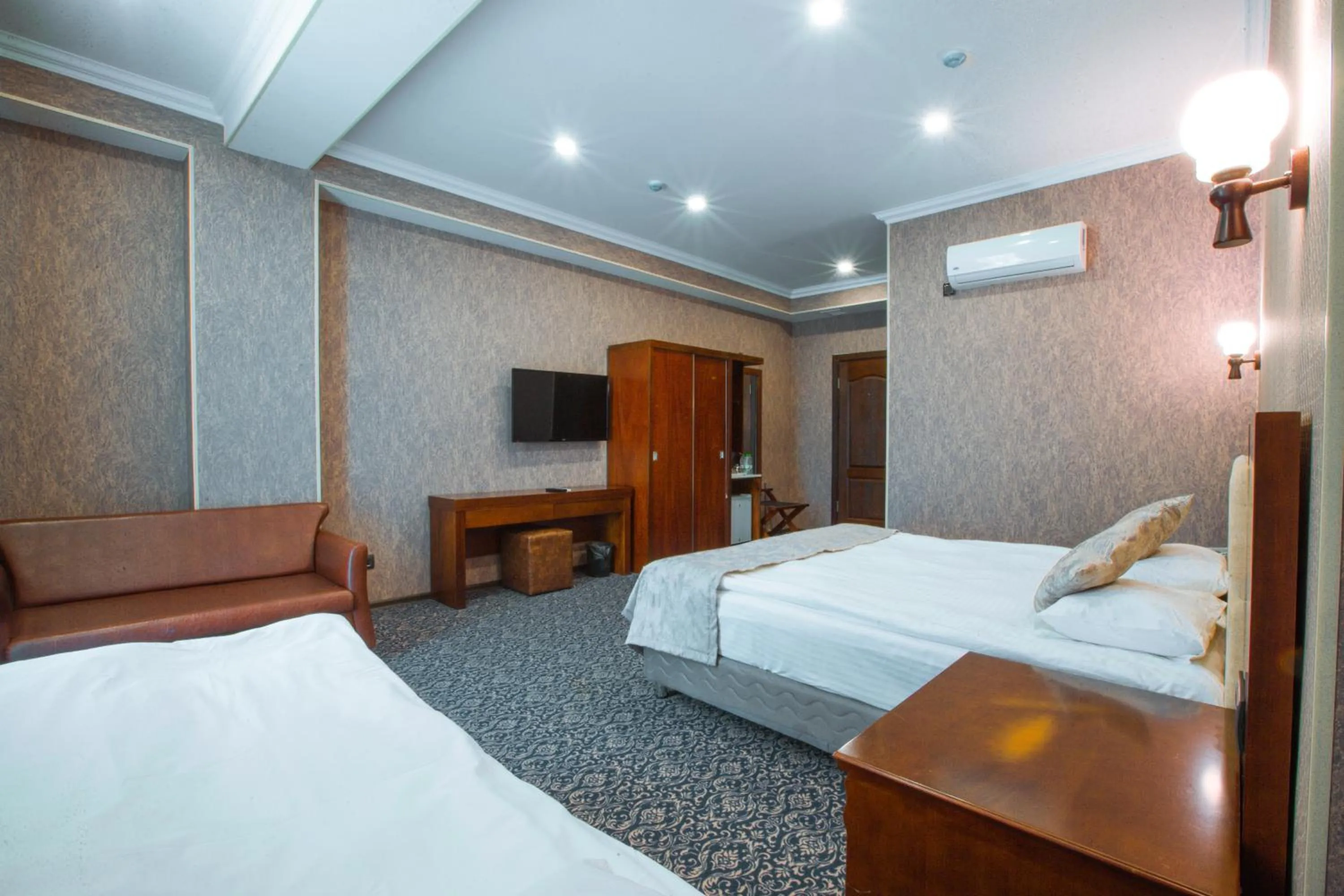 Photo of the whole room, Bed in Ruma Qala Hotel