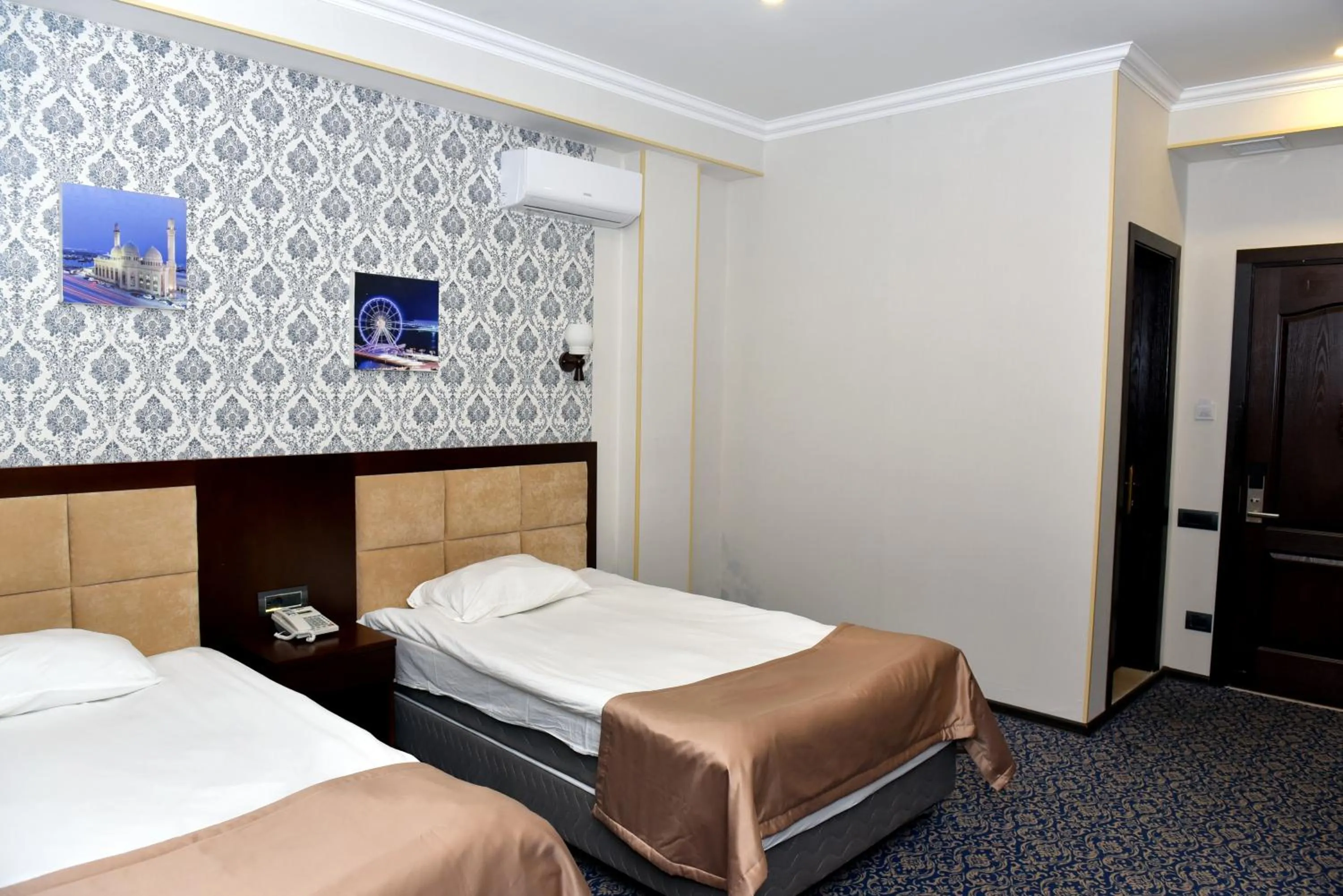 Bed in Ruma Qala Hotel