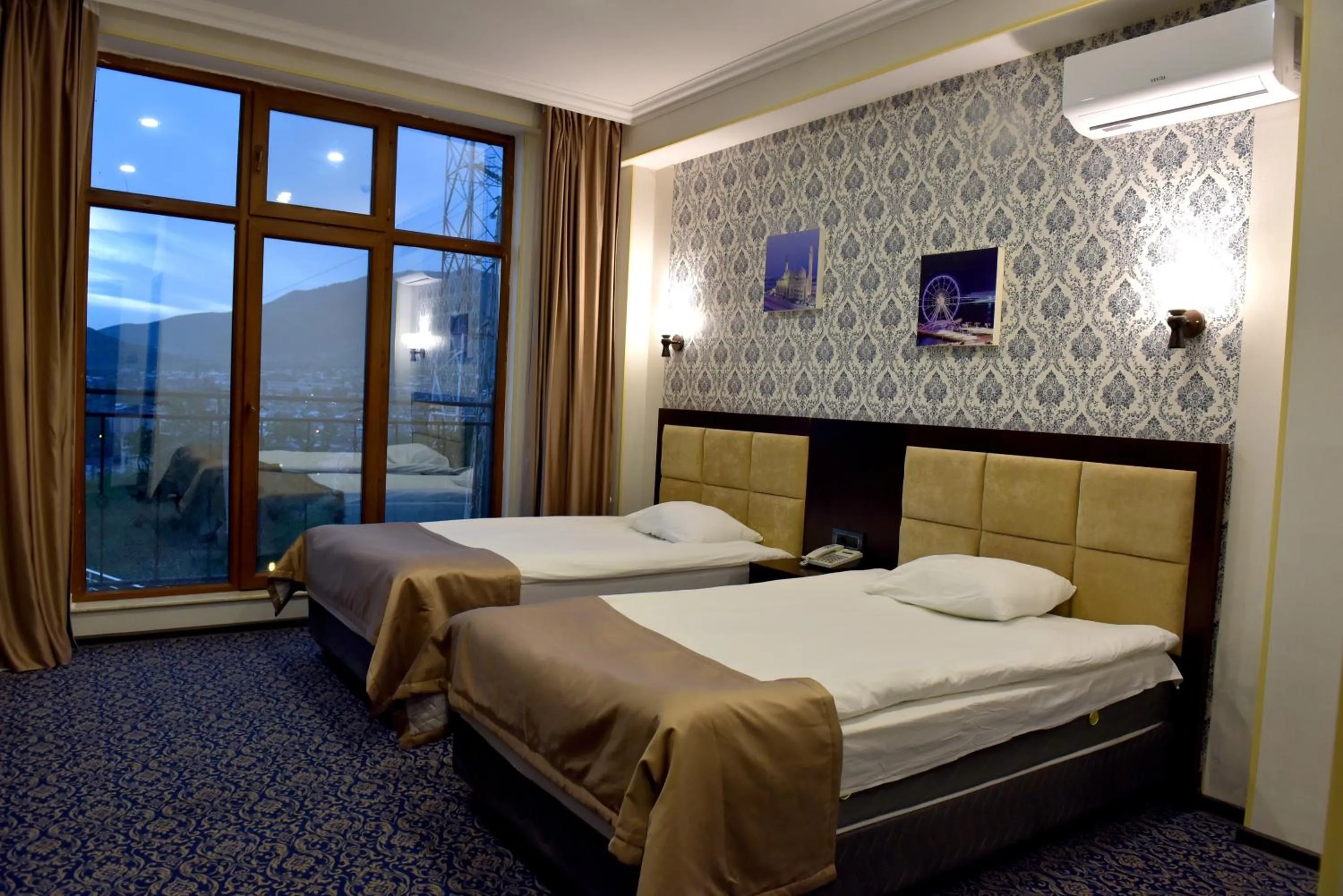 Bed in Ruma Qala Hotel