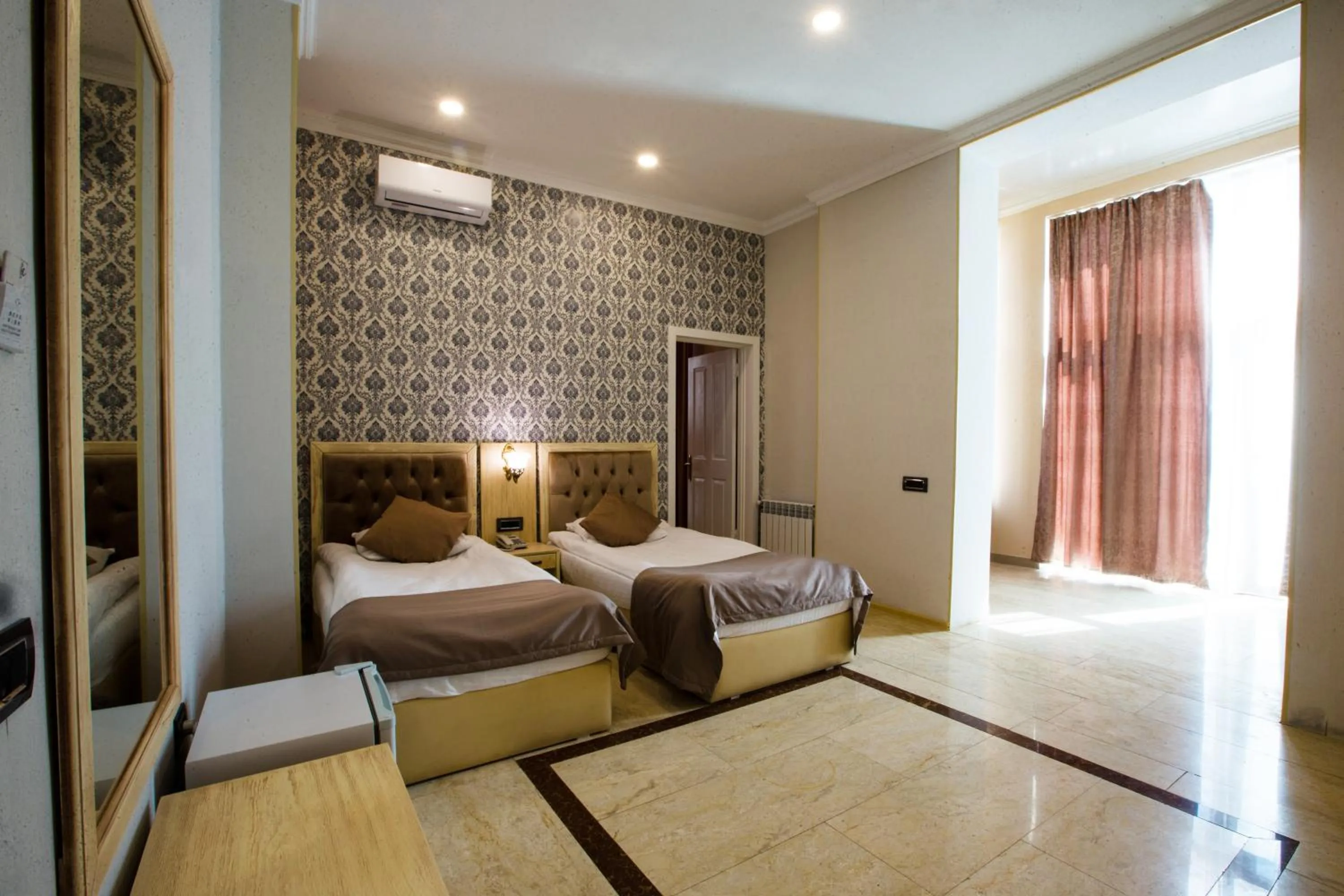 Photo of the whole room, Bed in Ruma Qala Hotel