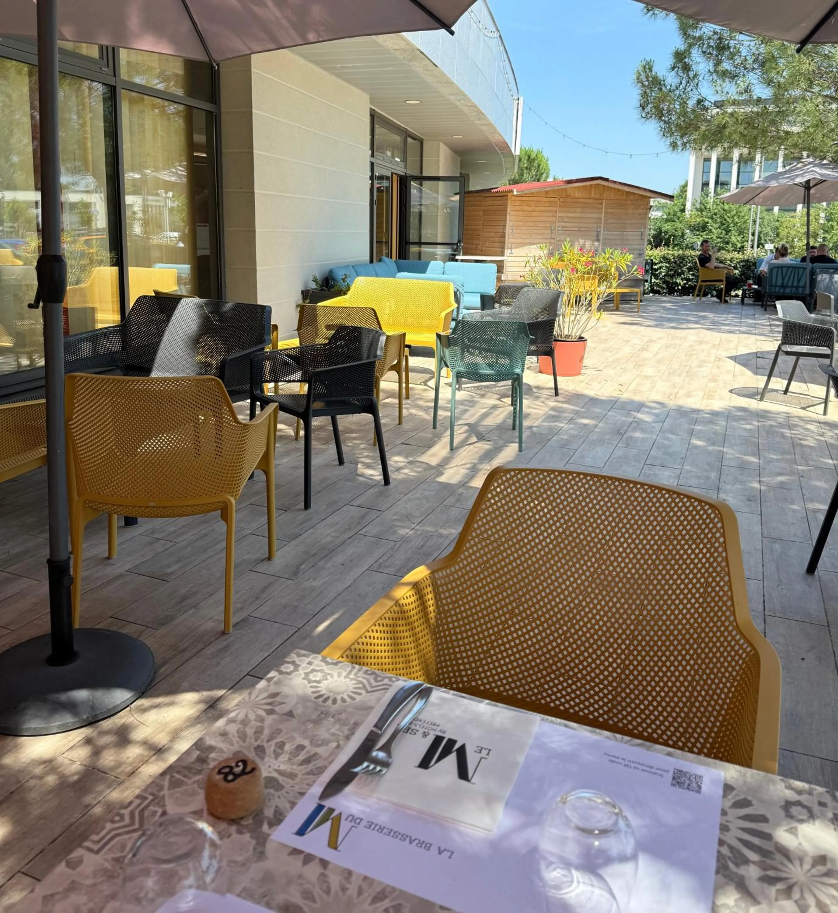 Patio in Le M & Spa Bordeaux Aéroport by Hôtels & Préférence