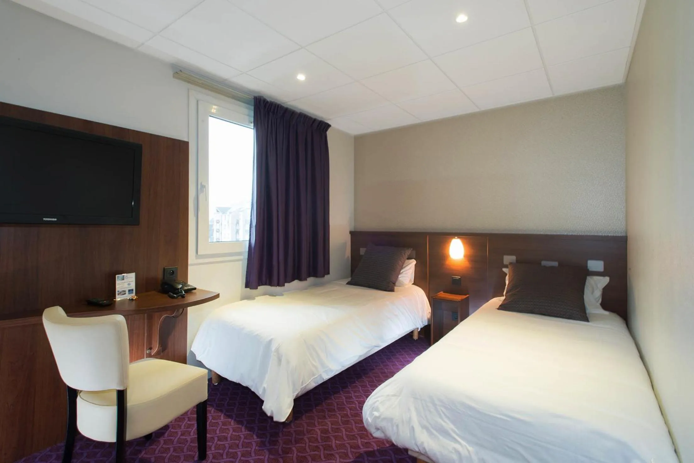 Bedroom, Bed in Brit Hotel Tours Sud – Le Cheops