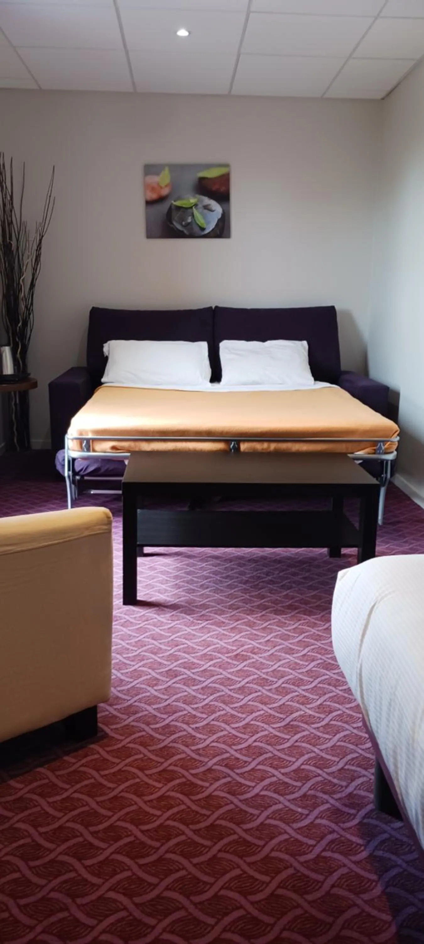 Seating area, Bed in Brit Hotel Tours Sud – Le Cheops