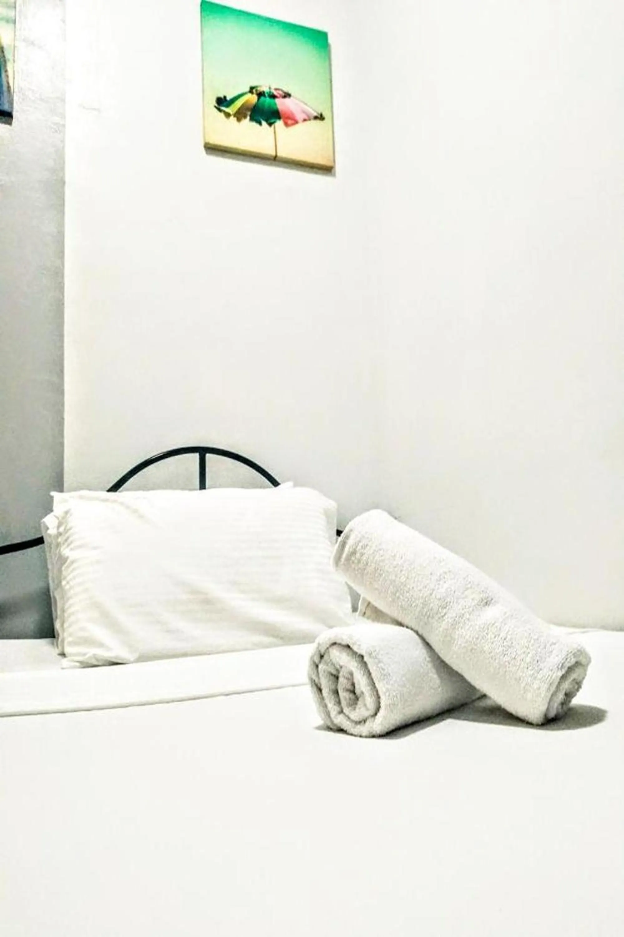 Bed in Hometel Barrio House Mactan